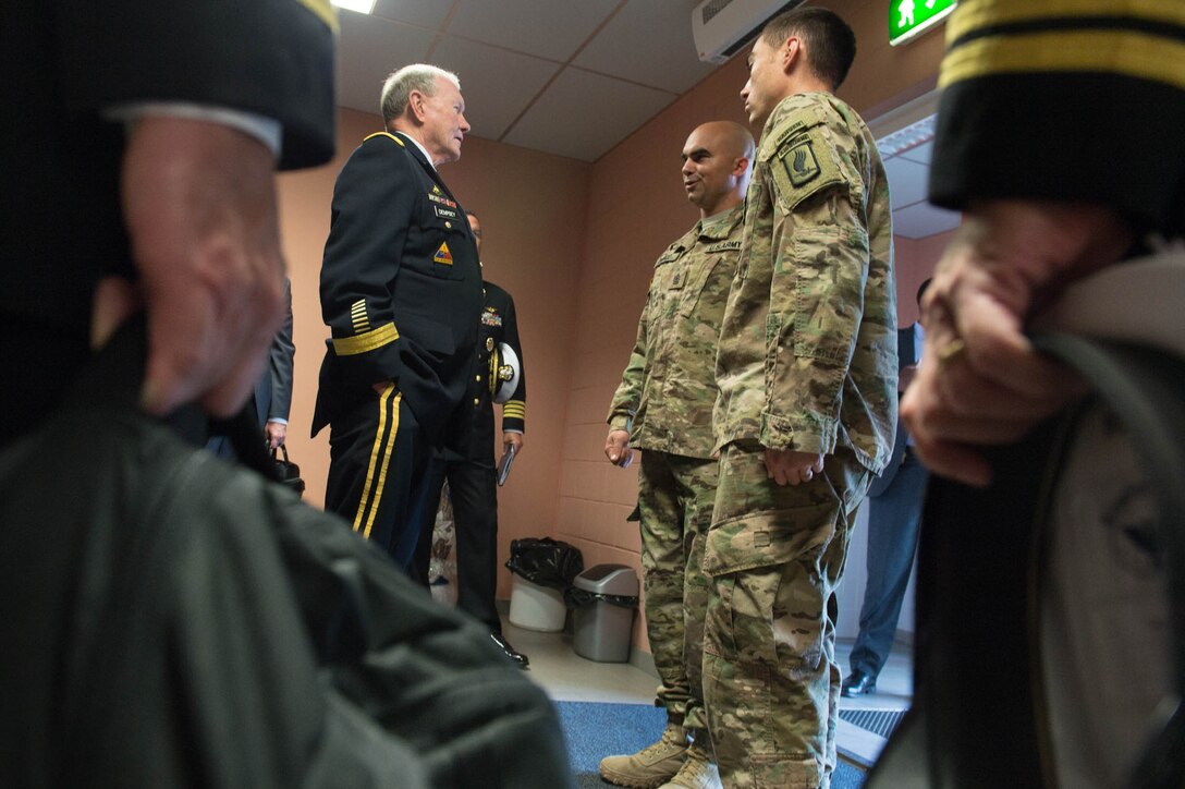 U.S. Army Gen. Martin E. Dempsey, left center, chairman of the Joint Chiefs of Staff, speaks with U.S. soldiers at the Estonian 1st Brigade Headquarters in Tapa, Estonia, Sept. 15, 2015. DoD photo by D. Myles Cullen