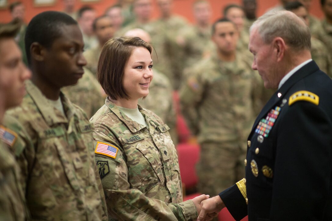 U.S. Army Gen. Martin E. Dempsey, chairman of the Joint Chiefs of Staff, shakes hands with a U.S. soldier at the Estonian 1st Brigade Headquarters in Tapa, Estonia, Sept. 15, 2015. DoD photo by D. Myles Cullen
