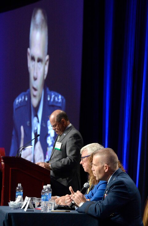 Lt. Gen. Steven L. Kwast, Air University commander and president, answers a question with panelists, Daniel R. Sitterly, principal deputy assistant secretary of the Air Force, and Michelle S. LoweSolis, Director of Plans and Integration, Deputy Chief of Staff for Manpower and Personnel, during a discussion about "Human Capital Plan," at the Air Force Association Air and Space Conference and Technology Exposition, Sept. 15, 2015, in Washington, D.C. The Air Force experts talked about the way-ahead for equipping, training and growing future Airmen. (U.S. Air Force photo by Scott M. Ash) 