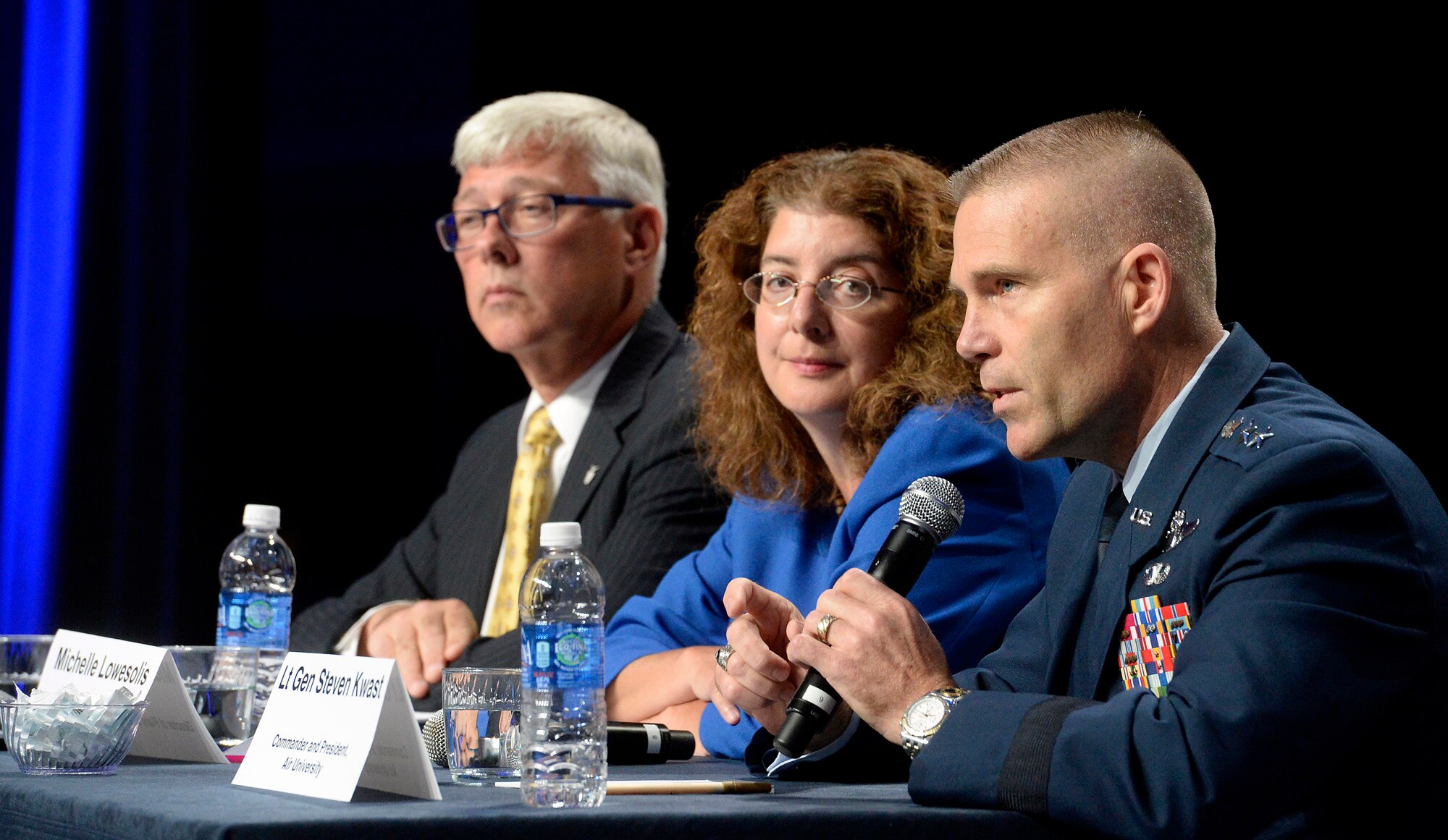 Air University Commander and President Lt. Gen. Steven L. Kwast answers a question with panelists, Principal Deputy Assistant Secretary of the Air Force Daniel R. Sitterly, and Michelle S. LoweSolis, the director of plans and integration, deputy chief of staff for manpower and personnel, Headquarters Air Force, during a discussion about the human capital plan at the Air Force Association Air and Space Conference and Technology Exposition Sept. 15, 2015, in Washington, D.C. The Air Force experts talked about the way-ahead for equipping, training and growing future Airmen. (U.S. Air Force photo/Scott M. Ash)