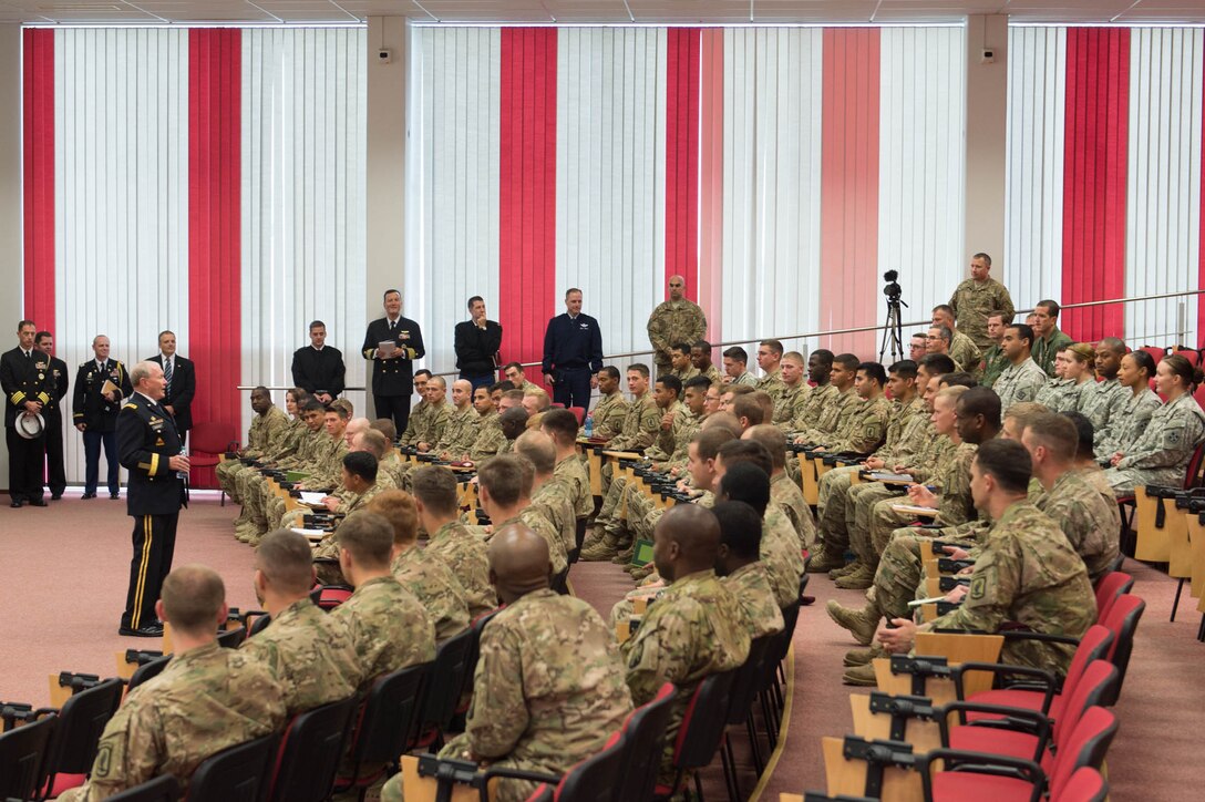 U.S. Army Gen. Martin E. Dempsey, chairman of the Joint Chiefs of Staff, talks with U.S. soldiers at the Estonian 1st Brigade Headquarters in Tapa, Estonia, Sept. 15, 2015. DoD photo by D. Myles Cullen