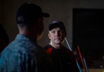 Tech. Sgt. Nicholas Lalonde (left), Pacific Angel 15-2 structural craftsman, discusses construction plans with New Zealand army Sapper Reece Stairmand, PACANGEL 15-2 carpenter, during an engineering project Sept. 5, 2015, in Baucau, Timor-Leste. Efforts undertaken during Pacific Angel help multilateral militaries in the Pacific improve and build relationships across a wide spectrum of civic operations, which bolsters each nation’s capacity to respond and support future humanitarian assistance and disaster relief operations. (U.S. Air Force photo by Staff Sgt. Alexander W. Riedel/Released)