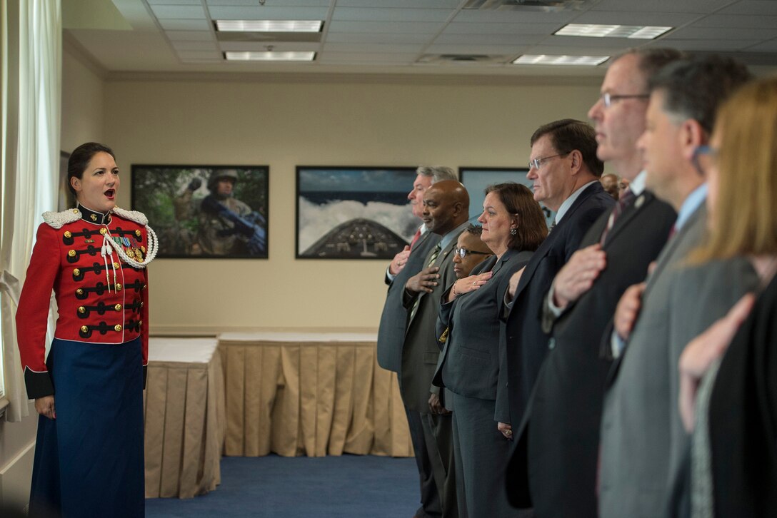 Marine Corps Gunnery Sgt. Sara Dell'omo of the U.S. Marine Band sings the national anthem during the Combined Federal Campaign kickoff ceremony at the Pentagon, Sept. 15, 2015. DoD photo by U.S. Air Force Senior Master Sgt. Adrian Cadiz