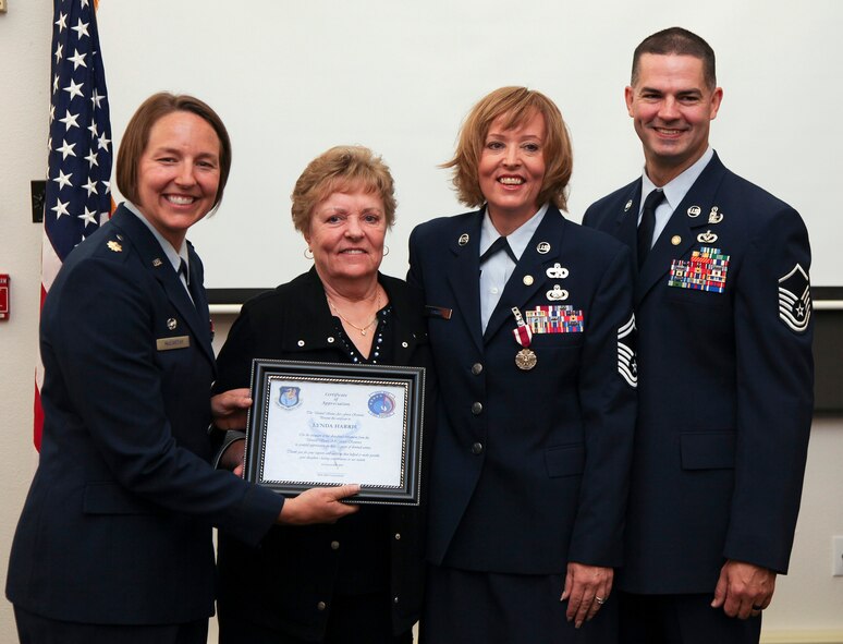 TRAVIS AIR FORCE BASE, Calif. -- Senior Master Sgt. Andrea Harris, 45th Aerial Port Squadron, is honored in a retirement ceremony at Travis AFB, Calif., Sept. 12, 2015.  (U.S. Air Force photo/Lt. Col. Robert Couse-Baker/Released)