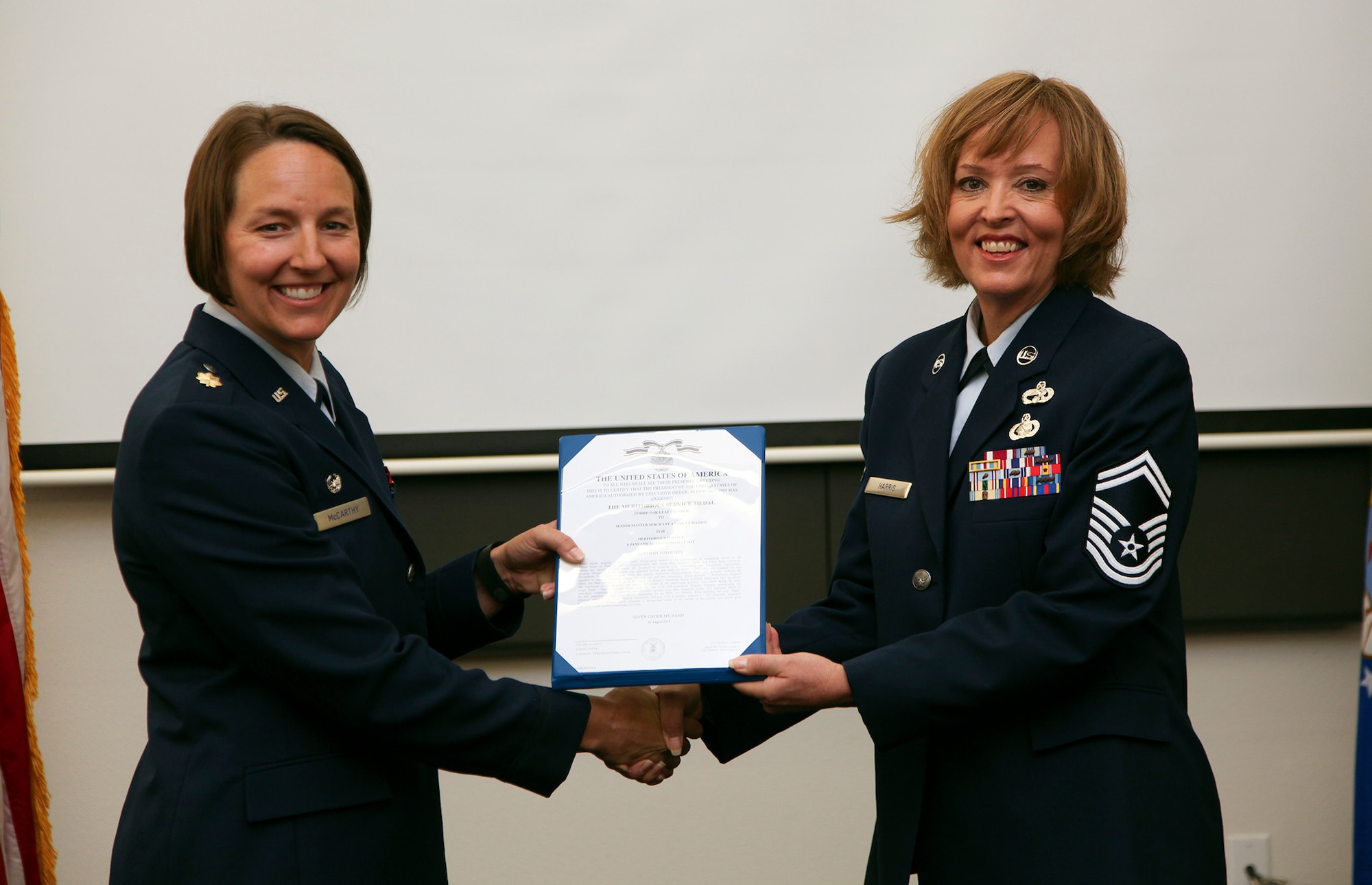 TRAVIS AIR FORCE BASE, Calif. -- Senior Master Sgt. Andrea Harris, 45th Aerial Port Squadron, is honored in a retirement ceremony at Travis AFB, Calif., Sept. 12, 2015.  (U.S. Air Force photo/Lt. Col. Robert Couse-Baker/Released)