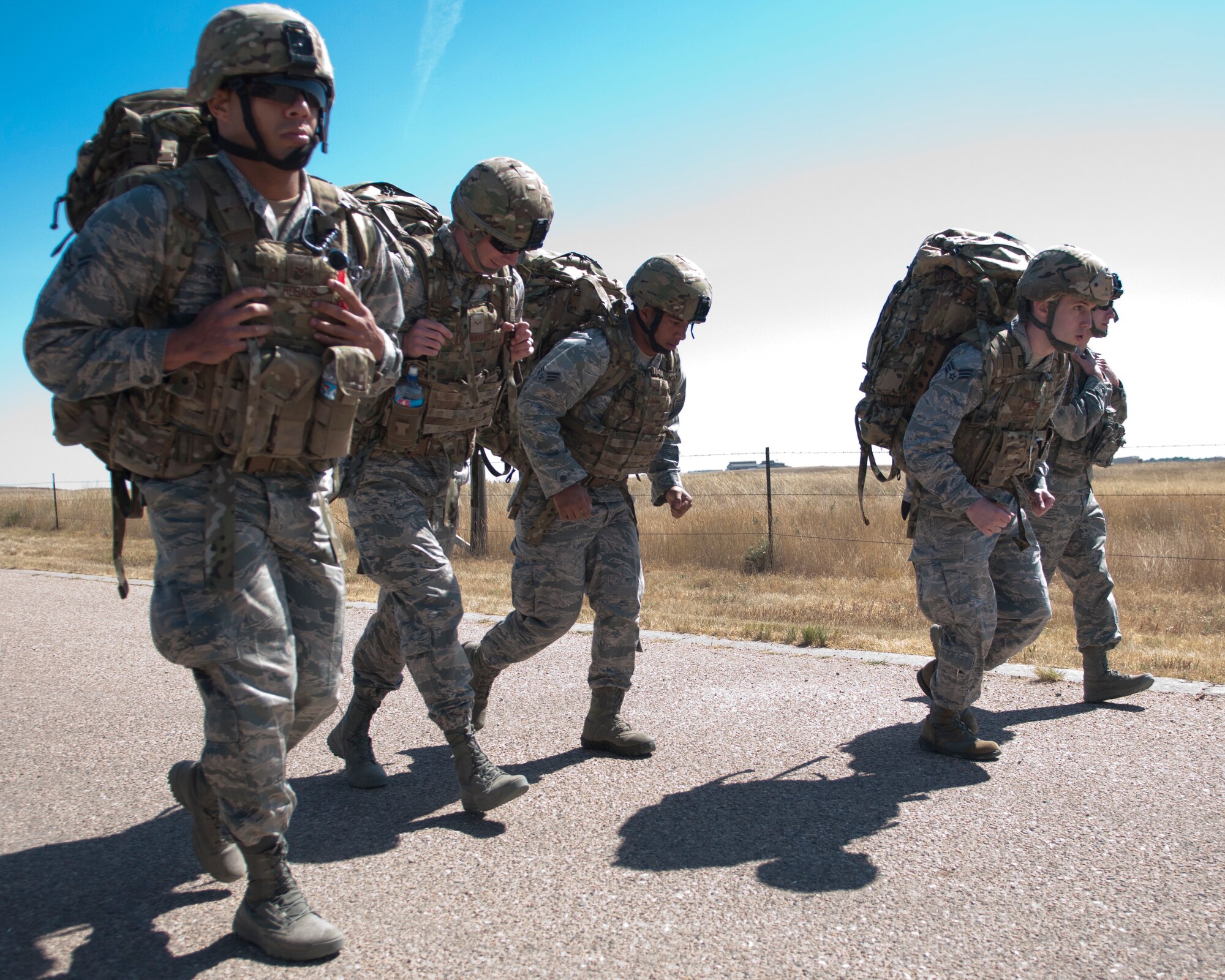 Security forces members begin the ruck run portion of the 2015 Crow Creek Challenge, Sept. 11, 2015, on F.E. Warren Air Force Base, Wyo. There were a total of 13 teams competing in this year’s competition. (U.S. Air Force photo by Airman 1st Class Malcolm Mayfield)