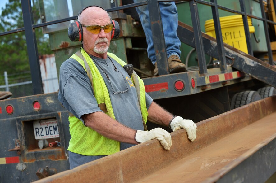 Bud Thrift, Timberline Environmental Services third party quality assurance officer, prepares to review a load of crushed bombs at Poinsett Electronic Combat Range, Wedgefield, S.C., Aug. 20, 2015. Every three to five years, contractors inspect spent munitions dropped at the range for explosive hazards and process them to be sold as scrap metal. (U.S. Air Force photo by Senior Airman Diana M. Cossaboom/Released)