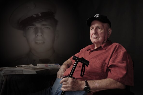 Retired U.S. Army 1st Sgt. Ray Frazier reflects on his time as a prisoner of war during the Korean War at Davis-Monthan Air Force Base, Ariz., Aug. 28, 2015. Frazier joined the army when he was 16 years old, and had to lie about his age just to get in. After serving for two years as a medical NCO, he was captured in South Korea by Chinese soldiers. He spent 865 days, five hours and 15 minutes as a POW in North Korea. Once liberated, Frazier continued to serve in the Army and retired after 22 years of service. (U.S. Air Force photo illustration by Senior Airman Cheyenne A. Powers/Released) 
