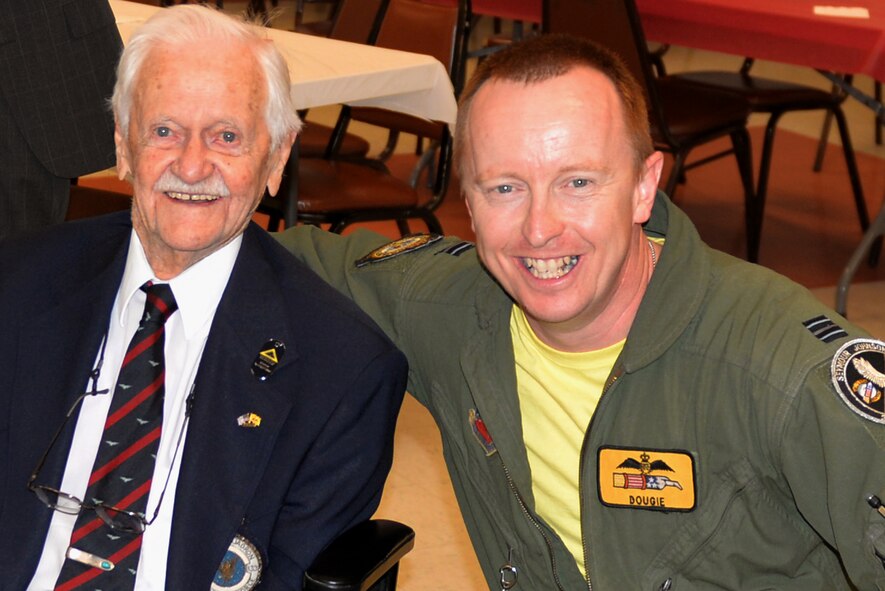 William “Bill” Slade (left) poses for a photo with Flt. Lt. Douglas McKay, 336th FS pilot, during his 100th birthday celebration, Sept. 3, 2015, at Roswell Air Force Base, New Mexico. Slade flew combat missions for the squadron during WWII, including the Battle of Britain. (Courtesy photo)