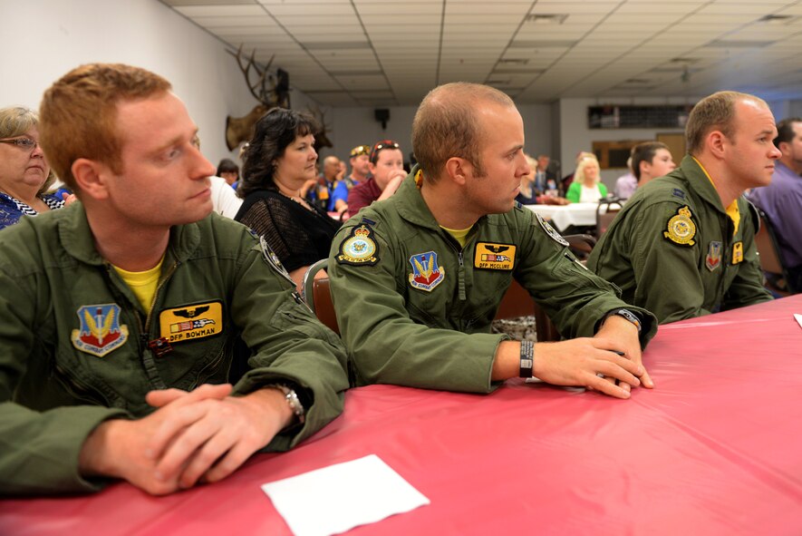 Airmen from the 336th Fighter Squadron listen to a speech at William “Bill” Slade’s 100th birthday celebration, Sept. 3, 2015, at Roswell Air Force Base, New Mexico. Slade, who turned 100 on Sept. 5, 2015, is the squadron’s oldest surviving member. (Courtesy photo)