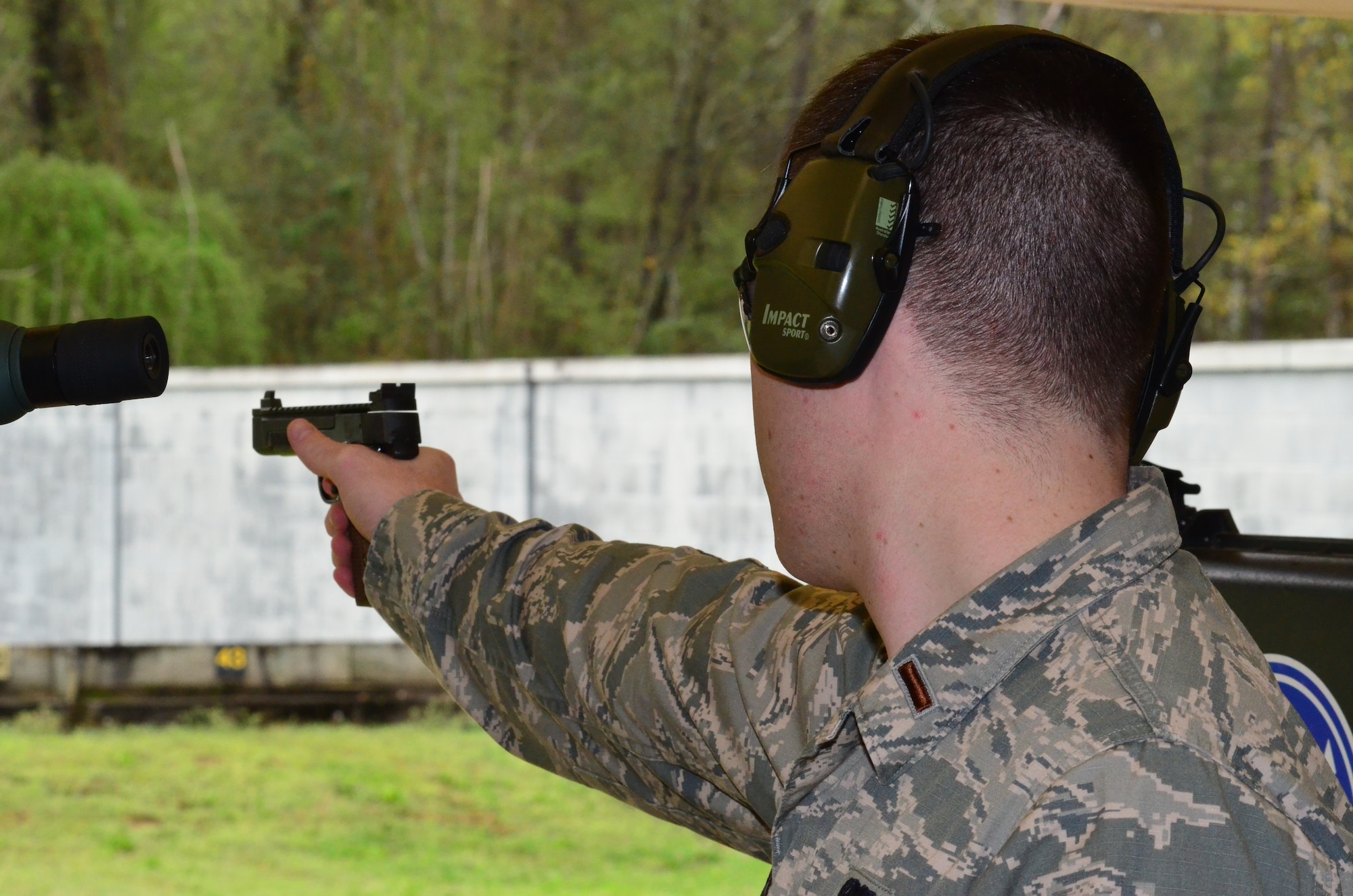 Second Lt. Tucker Sears, 436th Logistics Readiness Squadron material management officer in charge, shoots a .22-caliber pistol during Team Camp March 24, 2015, at Fort Benning, Ga. At Team Camp, Sears earned a spot on the Air Force National Pistol Team and has already competed in two competitions and placed first on the USAF Silver Team at the NRA National Outdoor Rifle and Pistol Championships at Camp Perry, Ohio. (U.S. Air Force photo/Lt. Col. Hugh M. Ragland)