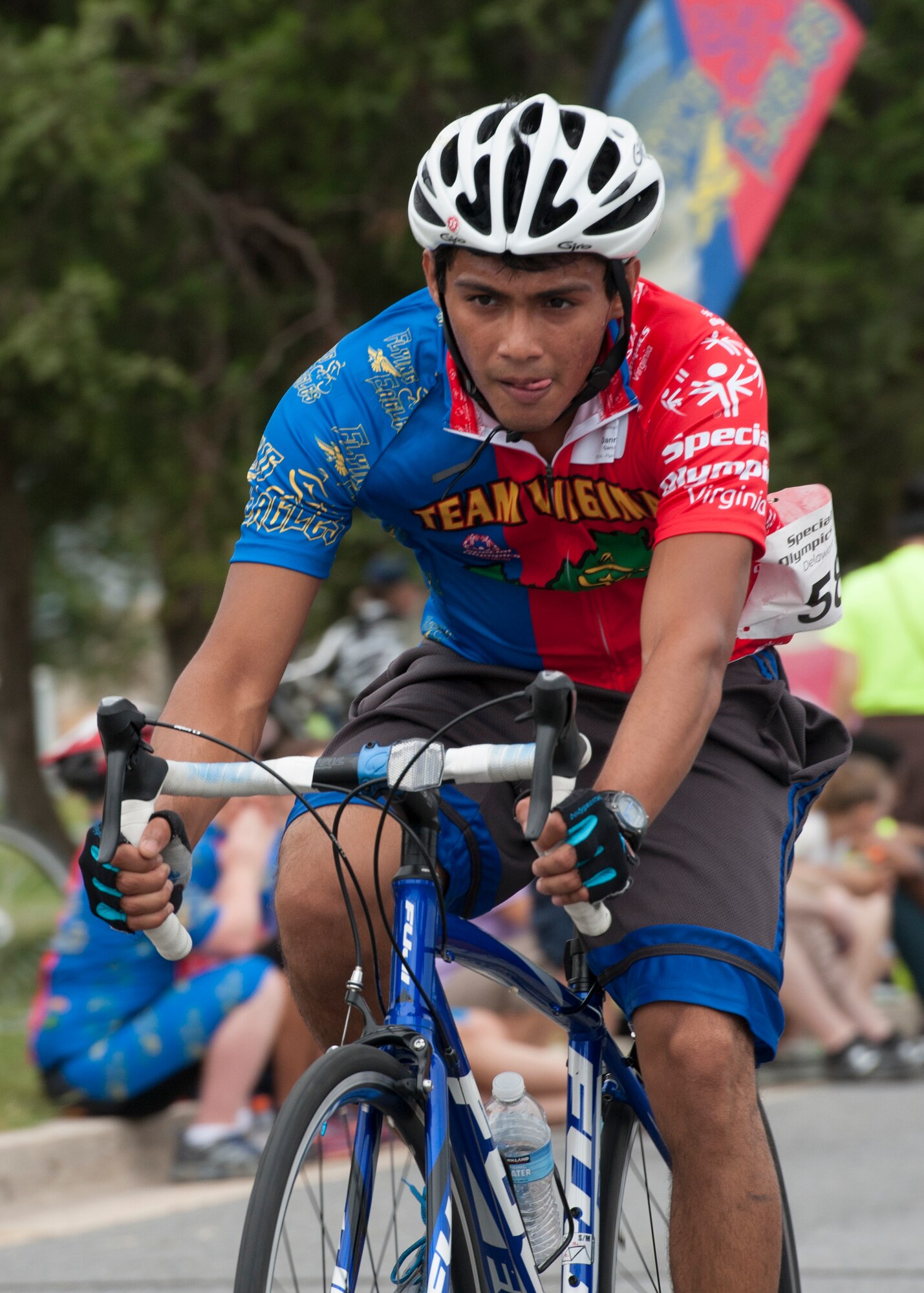Danny Garcia, Team Flying Eagles cyclist, focuses on the road course ahead during the 2015 Special Olympics Cycling Classic Sept. 12, 2015, at Dover Air Force Base, Del. Garica was one of 11 racers to attend the event from Team Flying Eagles. (U.S. Air Force photo/Airman 1st Class Zachary Cacicia)