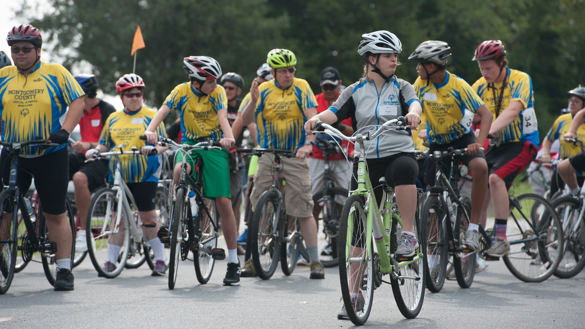 Cyclists ready themselves prior to a warm-up lap during the 2015 Special Olympics Cycling Classic Sept. 12, 2015, at Dover Air Force Base, Del. This event is held annually at Dover AFB with the support of Team Dover volunteers. (U.S. Air Force photo/Airman 1st Class Zachary Cacicia)