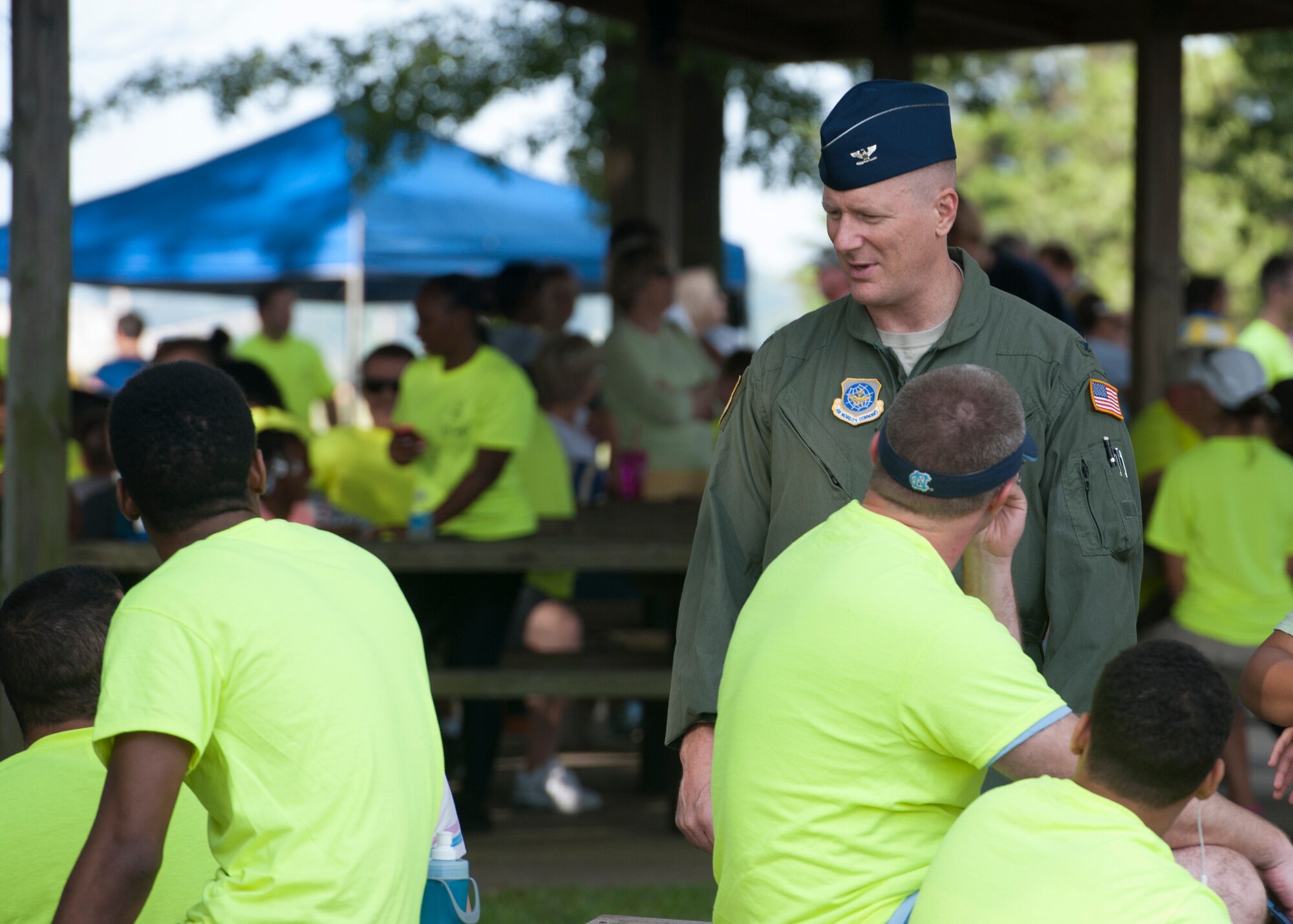 Col. Michael Grismer, 436th Airlift Wing commander, speaks to Team Dover volunteers at the 2015 Special Olympics Cycling Classic Sept. 12, 2015, at Dover Air Force Base, Del. Grismer presented the opening remarks at the event. (U.S. Air Force photo/Airman 1st Class Zachary Cacicia)