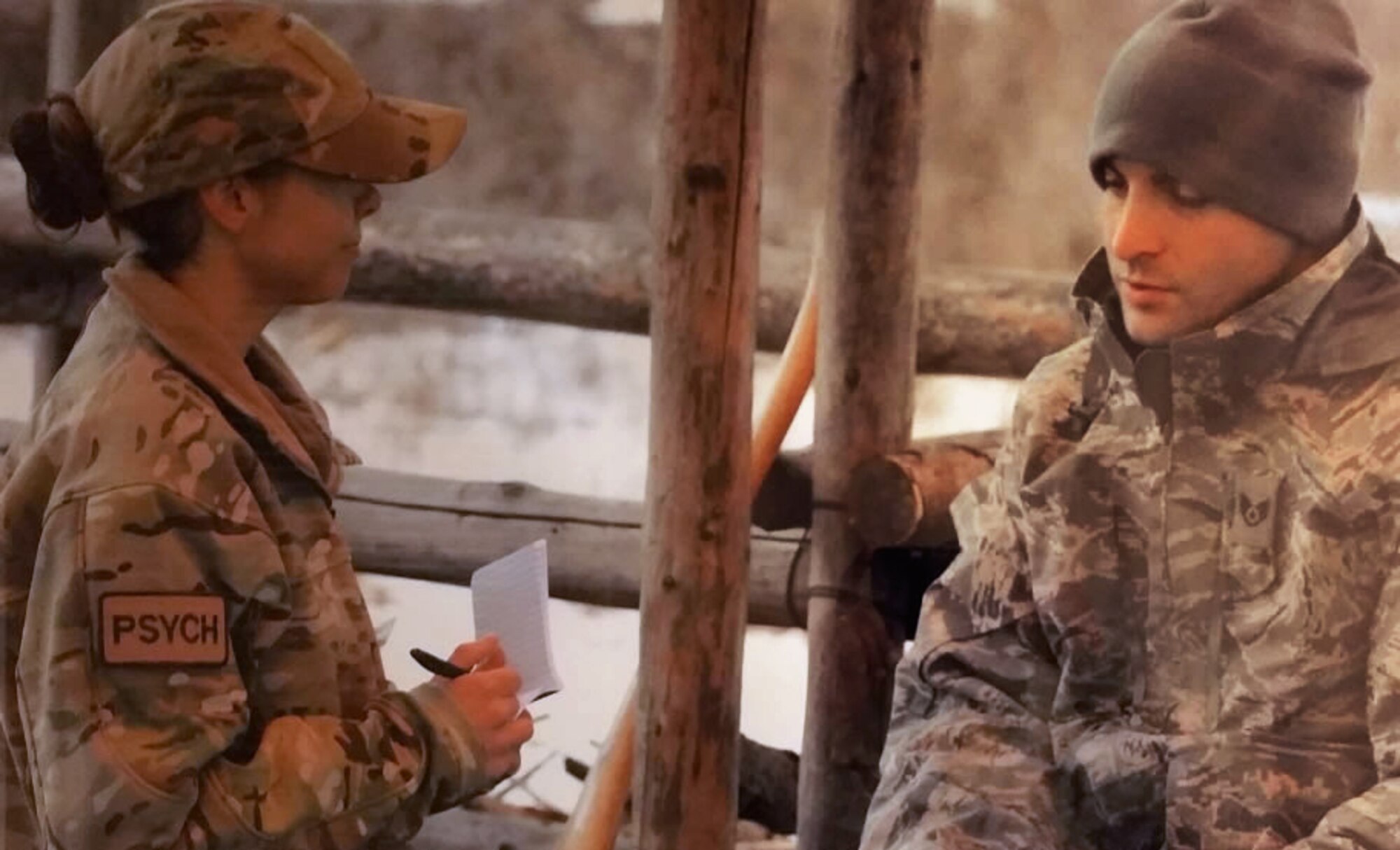 A psychologist evaluates a survival school student.  Survival, Evasion, Resistance and Escape (SERE) psychologists have more than a year of training and work independently in the field, supporting SERE training. (Courtesy photo)