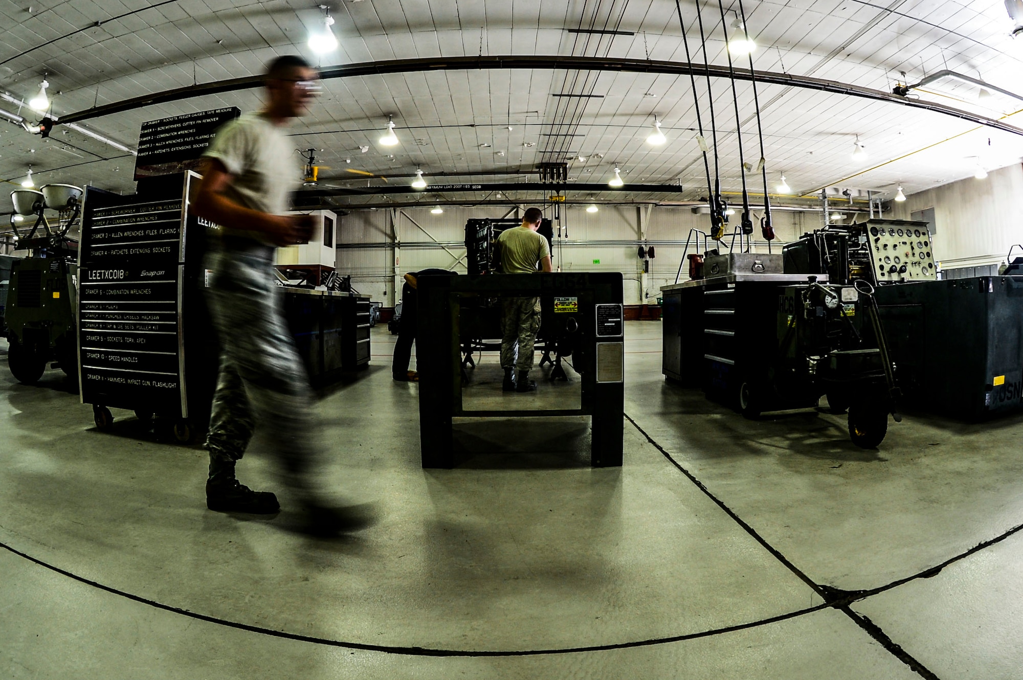 U.S. Air Force Senior Airman Dustin Edgell, 1st Maintenance Squadron aerospace ground equipment journeyman, prepares to conduct an annual Phase II inspection on a self-generating nitrogen cart at Langley Air Force Base, Va., Sept. 9, 2015.  The AGE flight technicians are skilled in the principles of electronics, refrigeration, hydraulics, power generation, reciprocating engines, gas turbine engines, and pneumatics and heating. (U.S. Air Force photo by Senior Airman Kayla Newman/Released)