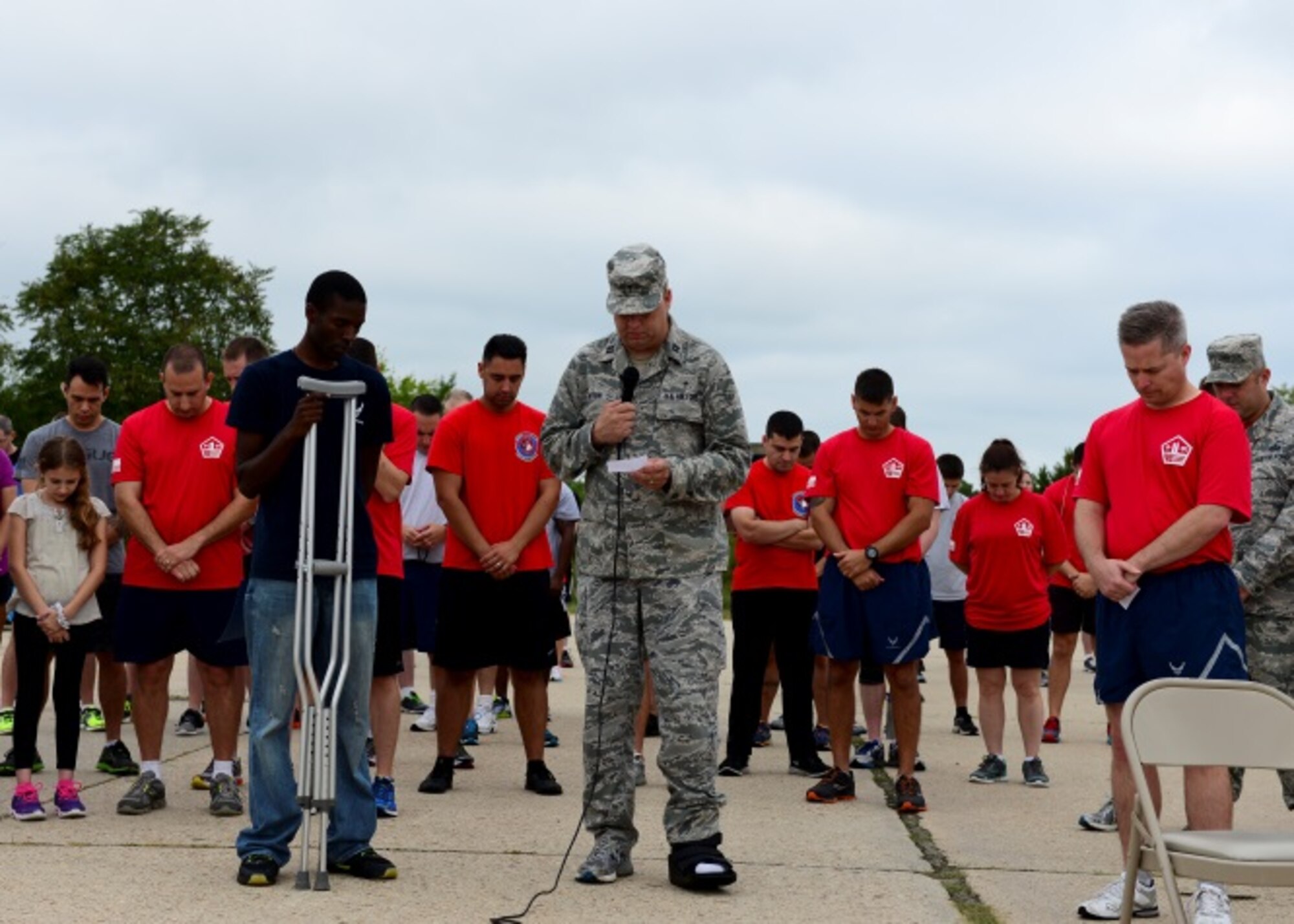 U.S. Air Force Chaplain (Capt.) Michael Gorton, 497th Intelligence Surveillance and Reconnaissance Group, gives an invocation before the 9/11 Never Forget Memorial 5K at Langley Air Force Base, Va., Sept. 11, 2015. Almost 3,000 Americans lost their lives due to the terrorist attacks that took place 14 years ago, on Sept. 11, 2001. (U.S. Air Force photo Airmen 1st Class Derek Seifert/ Released)