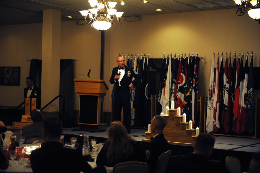 Retired Chief Master Sgt. Brian S. Hornback speaks during the Senior Non-Commissioned Officer Induction Ceremony at Minot Air Force Base, N.D., Sept. 11, 2015. Team Minot was honored to have Retired Chief Master Sgt. Brian S. Hornback lend his wisdom and experiences to the 52 selected technical sergeants at this time-honored event. (U.S. Air Force photo/Senior Airman Kristoffer Kaubisch)