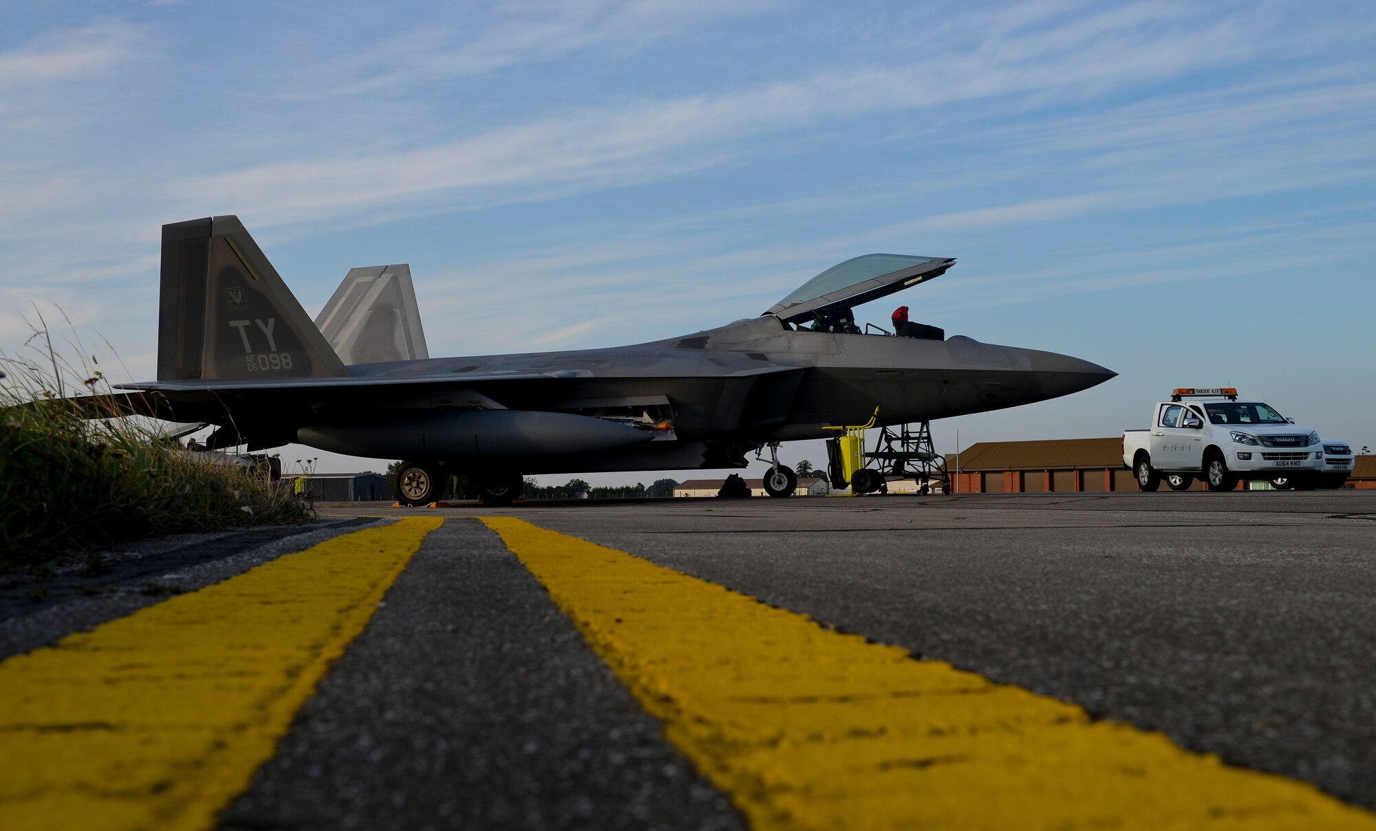 An F-22 Raptor from the 95th Fighter Squadron based at Tyndall Air Force Base, Fla., sits on the flightline Sept. 11, 2015, on RAF Mildenhall, England. The aircraft deployed to the European theater to conduct training with other European-based aircraft. (U.S. Air Force photo by Staff Sgt. Micaiah Anthony/Released)