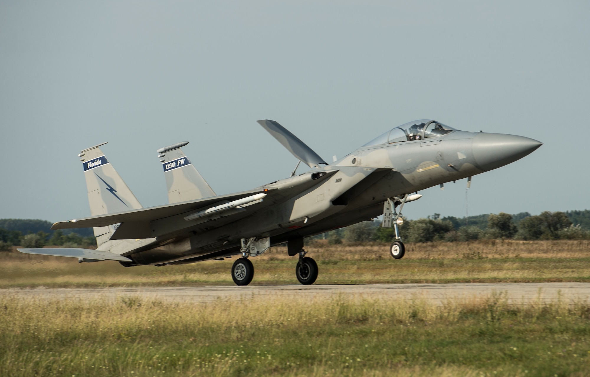 A U.S. Air Force F-15 Eagle fighter aircraft assigned to the 123rd Expeditionary Fighter Squadron lands at Kecskemet Air Base, Hungary Sept. 3, 2015. Four Oregon Air National Guard F-15s forward deployed to Hungary from Campia Turzii, Romania, as part of Operation Atlantic Resolve. (U.S. Air Force photo by Staff Sgt. Chad Warren/Released)