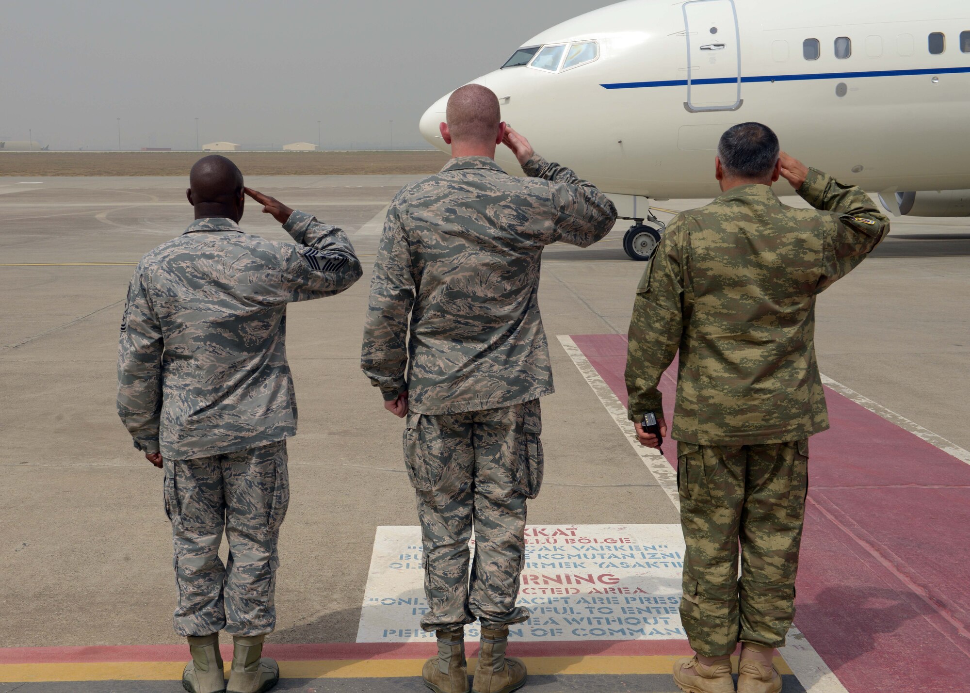 Chief Master Sgt. Vegas Clark, 39th Air Base Wing command chief (left), Col. John Walker, 39th ABW commander (center), and Brig. Gen. Ercan Van, 10th Tanker Base commander (right), greet the arrival of Gen. Philip M. Breedlove, NATO's Supreme Allied Commander for Europe and commander of U.S. European Command, Sept. 11, 2015, at Incirlik Air Base, Turkey. Breedlove visited Incirlik to meet with Turkish and US senior military leaders and get a firsthand look at their mission. (U.S. Air Force photo by Senior Airman Krystal Ardrey) 