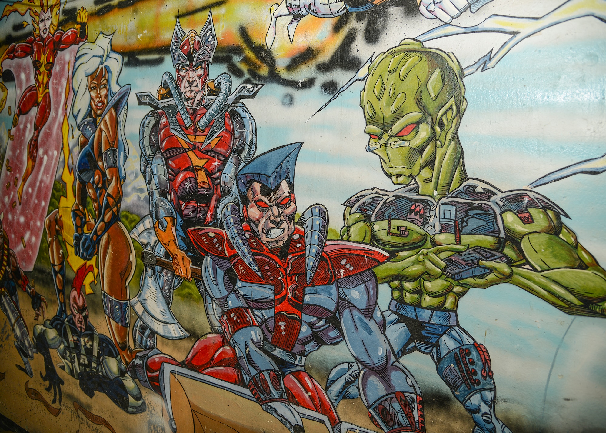 A Marvel-style comic mural dedicated to the men and women of Civil Engineering was uncovered during construction in Dorm 2424. The artwork was created in 1992 and later covered with drywall. (U.S. Air Force photo by Rebecca Amber)