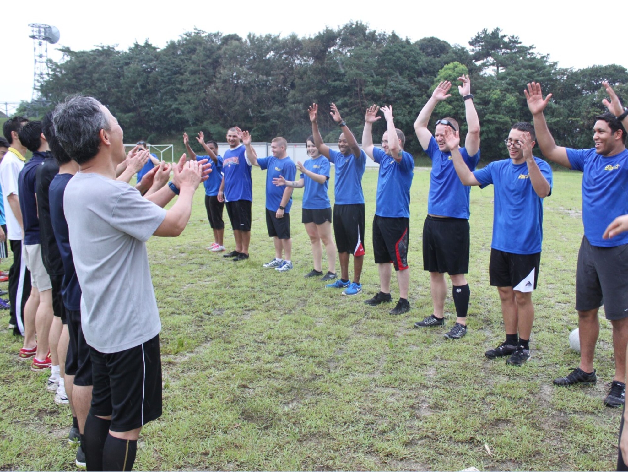 Airmen from the 623rd Air Control Flight play a game of kickball with their Japan Air Self-Defense Force counterparts Sept. 2, 2015 at Kasuga Direction Center, Japan. Bilateral exercises like an Aviation Training Relocation exercise not only encourage joint training, but strengthen Japanese and U.S. relations through community involvement and friendly competition. (Courtesy photo)