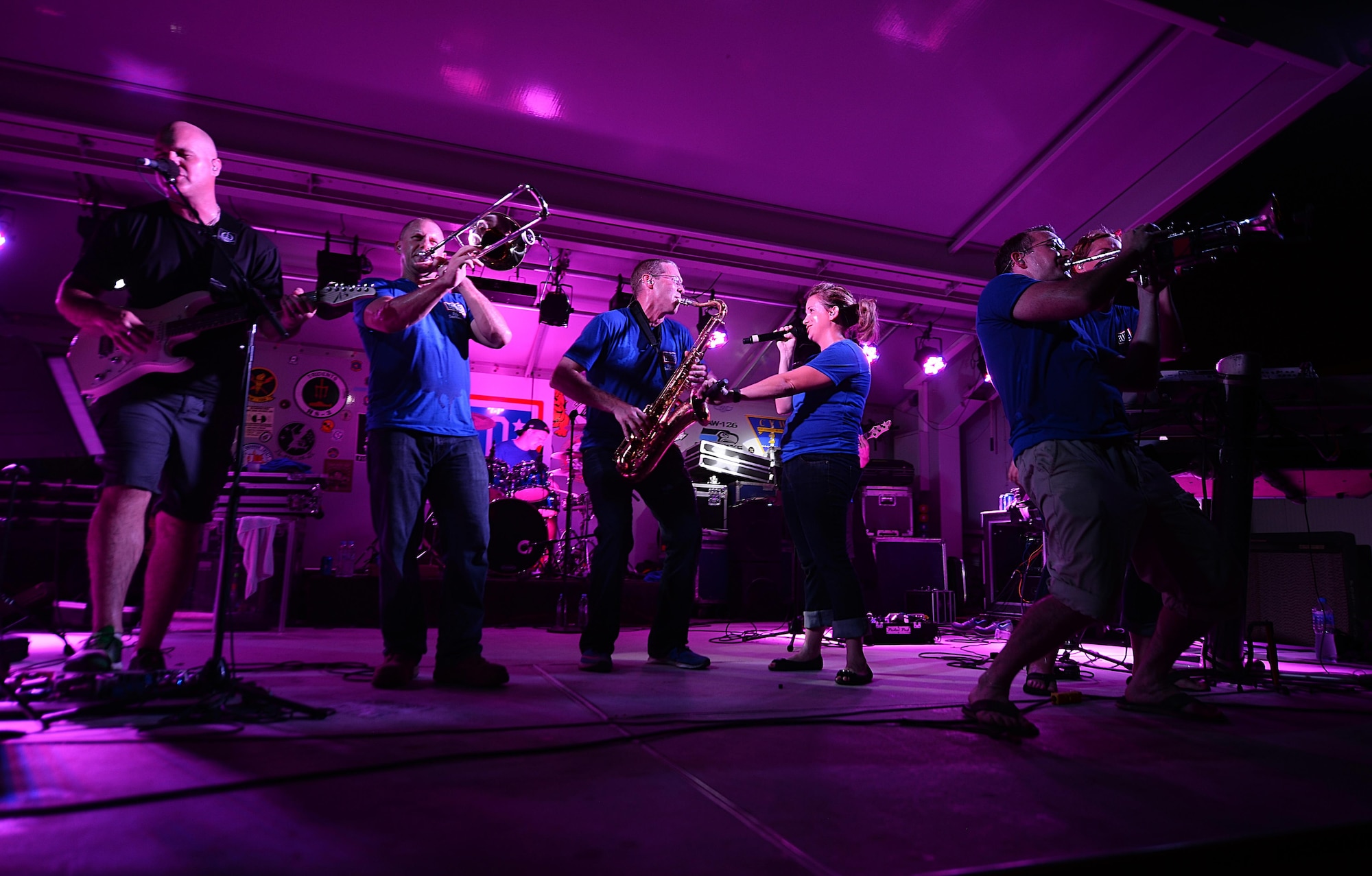Air Forces Central Command band members entertain service members during a performance at an
undisclosed location in Southwest Asia, Aug. 29, 2015. The AFCENT band is comprised of musicians who 
perform and tour throughout the area of responsibility to encourage troop morale, diplomacy and 
outreach to host nation communities. (U.S. Air Force photo by Staff Sgt. Emerson Nuñez/Released)