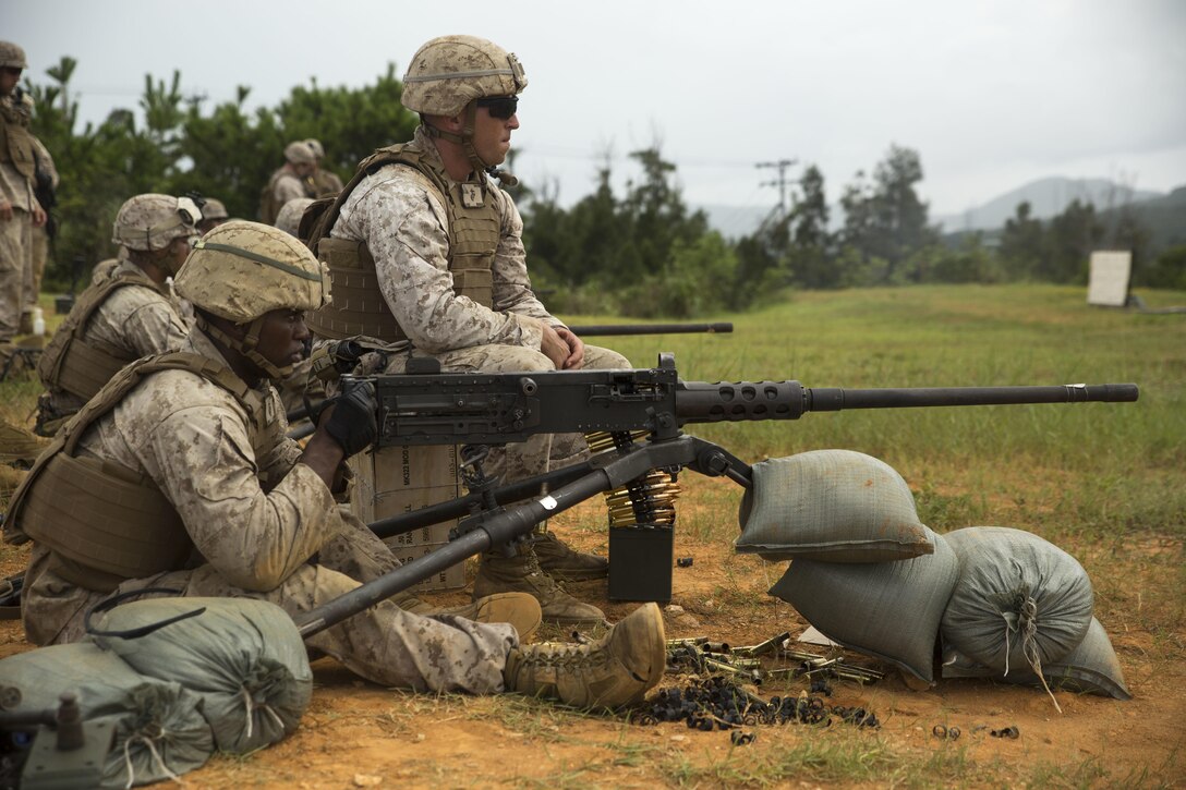 Lance Cpl. Lorenzo Jackson fires a .50-Caliber Heavy Machine Gun during 3rd Marine Division’s Annual Squad Competition, at Camp Hansen, Sept. 3, 2015. Marines throughout the division were evaluated on their weapons proficiency and infantry skills during the competition. Jackson, from Miami, Florida, is a machine gunner with Weapons Company, 2nd Battalion, 3rd Marine Regiment, 3rd Marine Division.