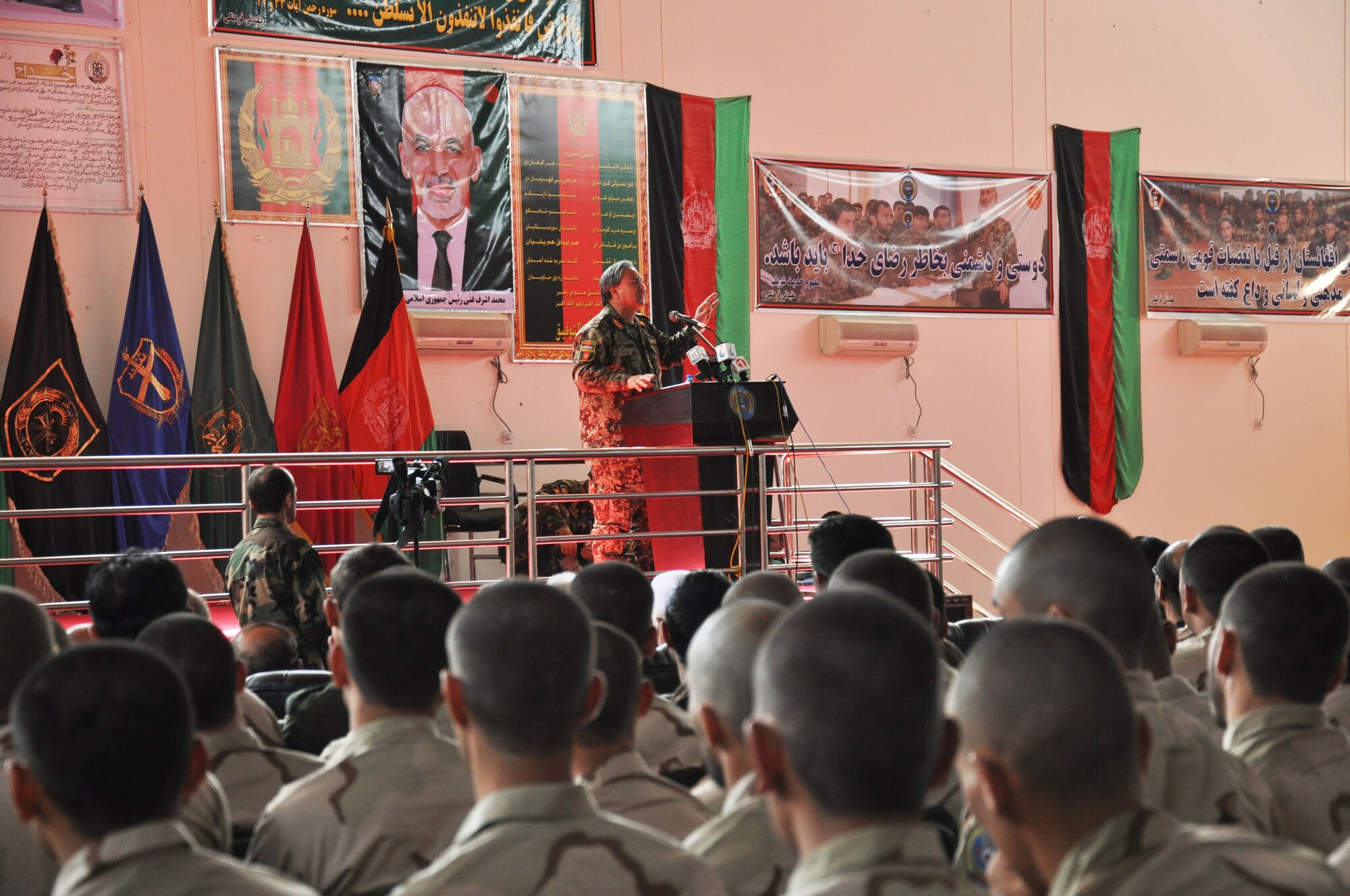 The Afghan National Army first deputy of the general chief of staff, speaks to approximately 189 Afghan Air Force cadets began their year-long officer candidate school training at Pohantoon-e-Hawayee (PeH), or Afghan Air Academy, during a ceremony here in early September. The Afghan OCS program focuses on English language, leadership and aviation studies. The cadets will fill required slots for the AAF in various air force careers in maintenance, flight engineering and pilots. 
(U.S. Air Force photo by Capt. Eydie Sakura/Released)