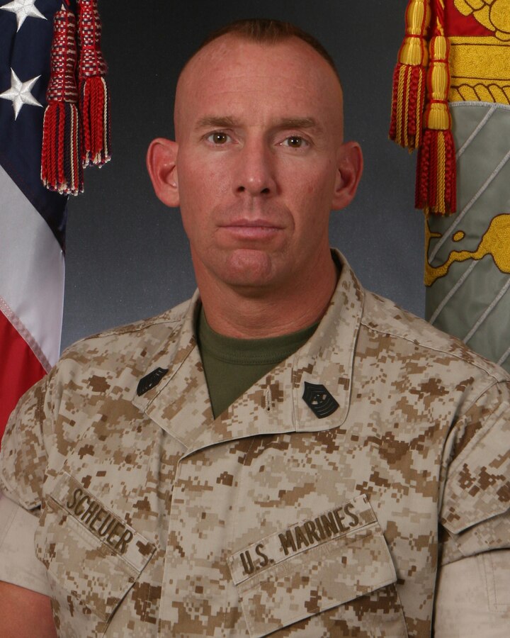 SgtMaj Scheuer command photo in the desert MARPAT uniform.