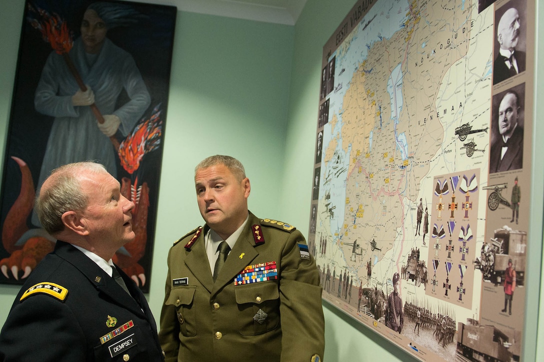 Estonian Lt. Gen. Riho Terras, commander of Estonian Defense Forces, and U.S. Army Gen. Martin E. Dempsey, chairman of the Joint Chiefs of Staff, review a historic map of Estonia at the Estonian Defense Forces Headquarters in Tallinn, Estonia, Sept. 14, 2015. (DoD photo by D. Myles Cullen