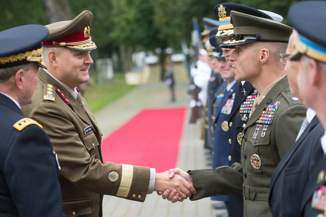 U.S. Army Gen. Martin E. Dempsey, chairman of the Joint Chiefs of Staff, introduces members of his staff to Estonian Lt. Gen. Riho Terras, commander of Estonian Defense Forces, at the Estonian Defense Forces Headquarters in Tallinn, Estonia, Sept. 14, 2015. DoD photo by D. Myles Cullen