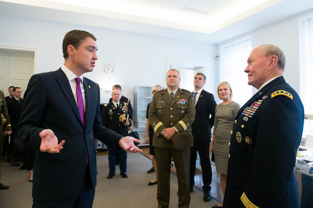 Estonian Prime Minister, Taavi Roivas, left, meets with U.S. Army Gen. Martin E. Dempsey, chairman of the Joint Chiefs of Staff, in Tallinn, Estonia, Sept. 14, 2015. DoD photo by D. Myles Cullen