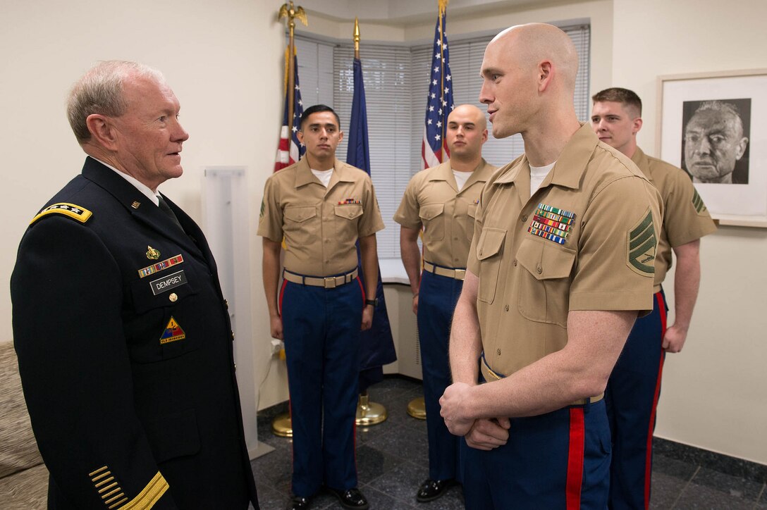 U.S. Army Gen Martin Dempsey, chairman of the Joint Chiefs of Staff, meets with Marines who provide security at the U.S. Embassy in Tallinn, Estonia, Sept 14, 2015.DoD photo by D. Myles Cullen