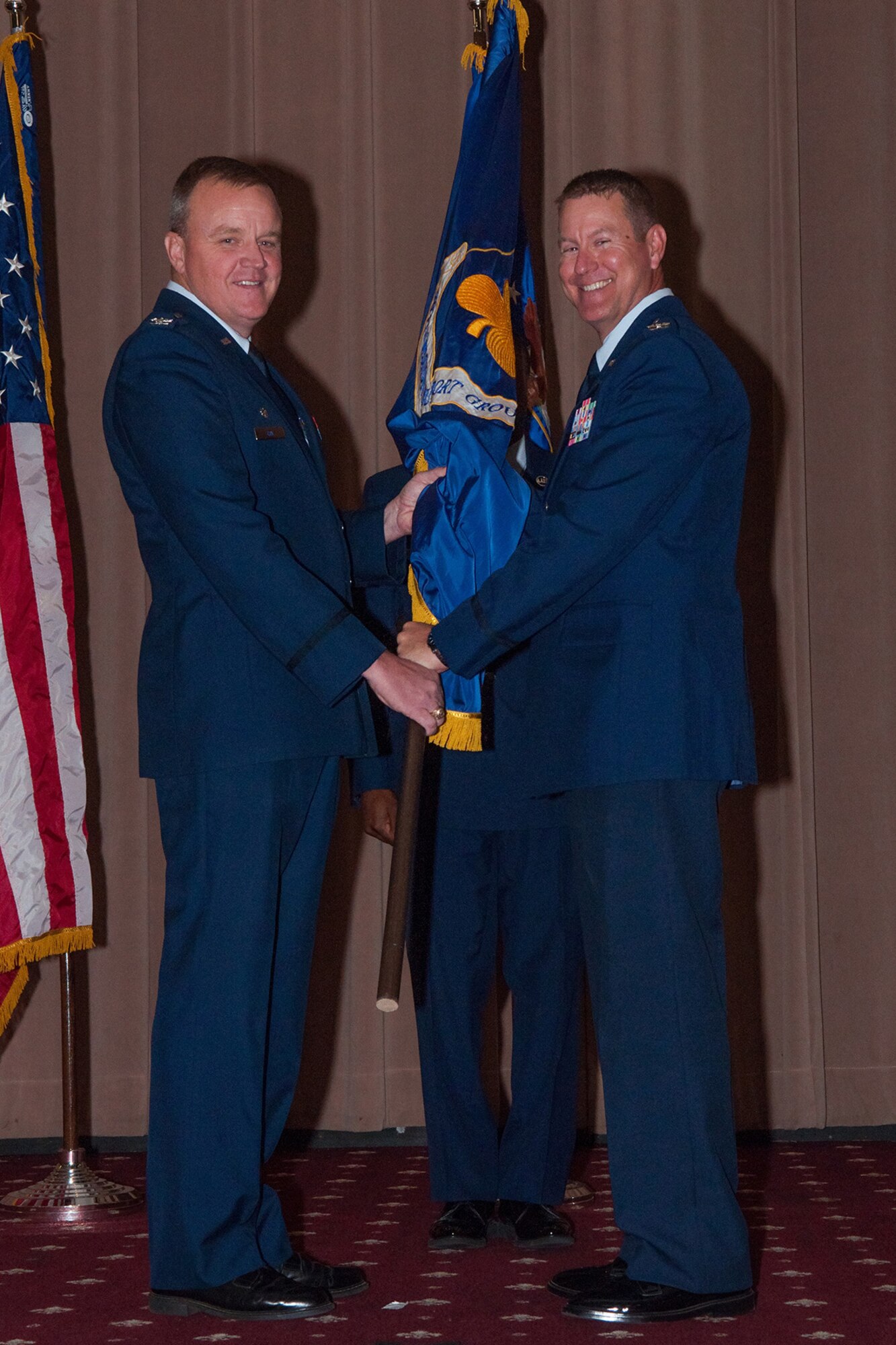 U.S. Air Force Col. Alan Rock (right), assumes command of the 307th Mission Support Group during a ceremony on September 13, 2015, Barksdale Air Force Base, La. As commander, Rock answers directly to the 307th Bomb Wing commander for all 307th MSG units to include the 307th Civil Engineering Squadron, 307th Logistics Readiness Squadron, 307th Security Forces Squadron and the 307th Force Support Squadron. (U.S. Air Force photo by Master Sgt. Dachelle Melville/Released)