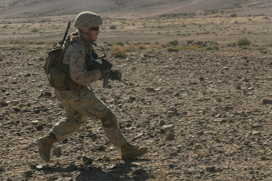 SOUTHWEST ASIA (Sept. 2, 2015) U.S. Marine 1st Lt. Ian Epperson runs to his next position during a bi-lateral training exercise. Epperson is a platoon commander with India Company, Battalion Landing Team 3rd Battalion, 1st Marine Regiment, 15th Marine Expeditionary Unit. The 15th MEU, embarked aboard the ships of the ESX ARG, is a forward-deployed, flexible sea-based MAGTF capable of engaging with regional partners and maintaining regional security. (U.S. Marine Corps photo by Sgt. Jamean Berry/Released)