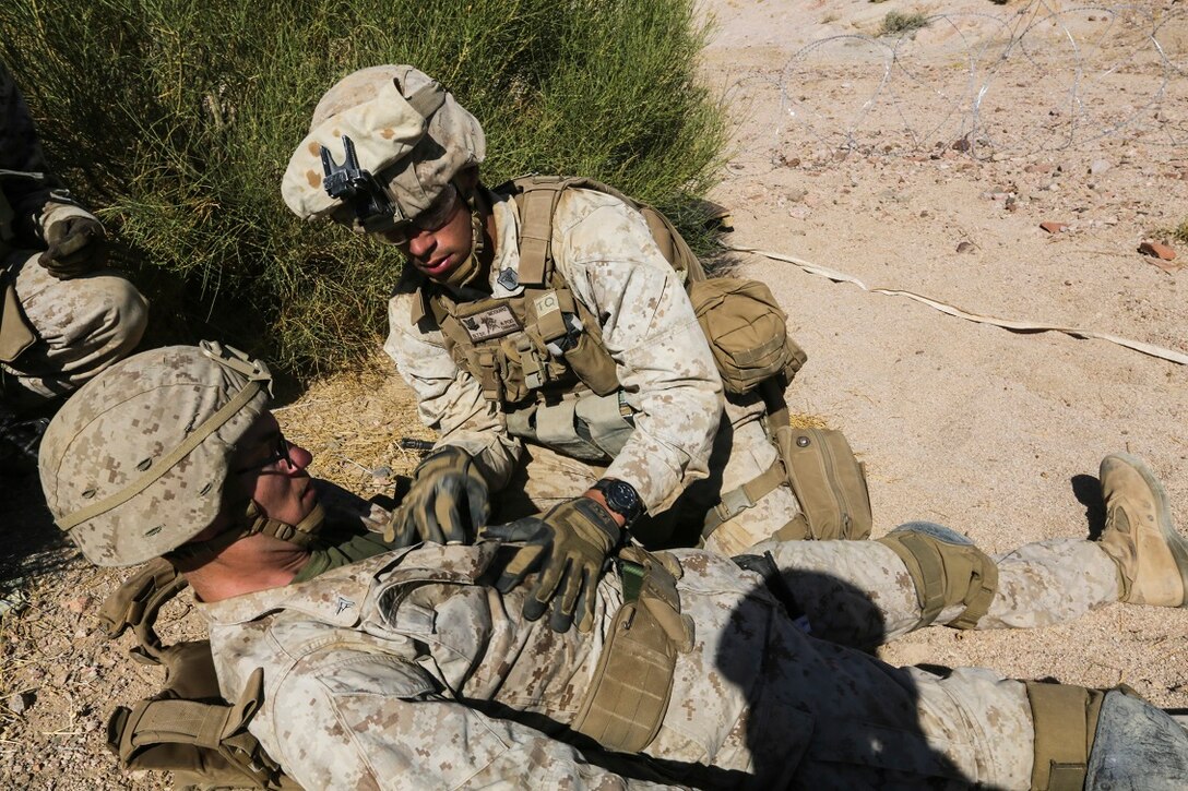 SOUTHWEST ASIA (Sept. 2, 2015) U.S. Navy Hospital Corpsman 2nd Class Devin McGuire treats a simulated casualty during a bi-lateral training exercise.  McGuire is a corpsman with India Company, Battalion Landing Team 3rd Battalion, 1st Marine Regiment, 15th Marine Expeditionary Unit. The 15th MEU, embarked aboard the ships of the ESX ARG, is a forward-deployed, flexible sea-based MAGTF capable of engaging with regional partners and maintaining regional security. (U.S. Marine Corps photo by Sgt. Jamean Berry/Released)