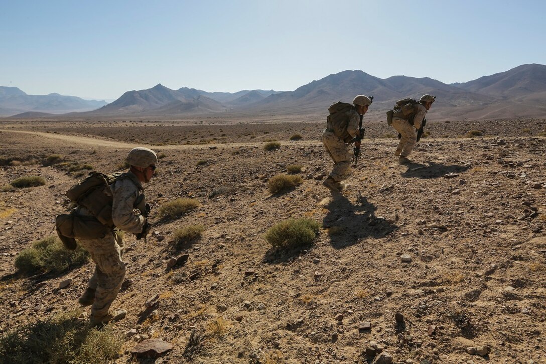SOUTHWEST ASIA (Sept. 2, 2015)  U.S. Marines with India Company, Battalion Landing Team 3rd Battalion, 1st Marine Regiment, 15th Marine Expeditionary Unit, move toward their objective during a bi-lateral training exercise. The 15th MEU, embarked aboard the ships of the ESX ARG, is a forward-deployed, flexible sea-based MAGTF capable of engaging with regional partners and maintaining regional security. (U.S. Marine Corps photo by Sgt. Jamean Berry/Released)