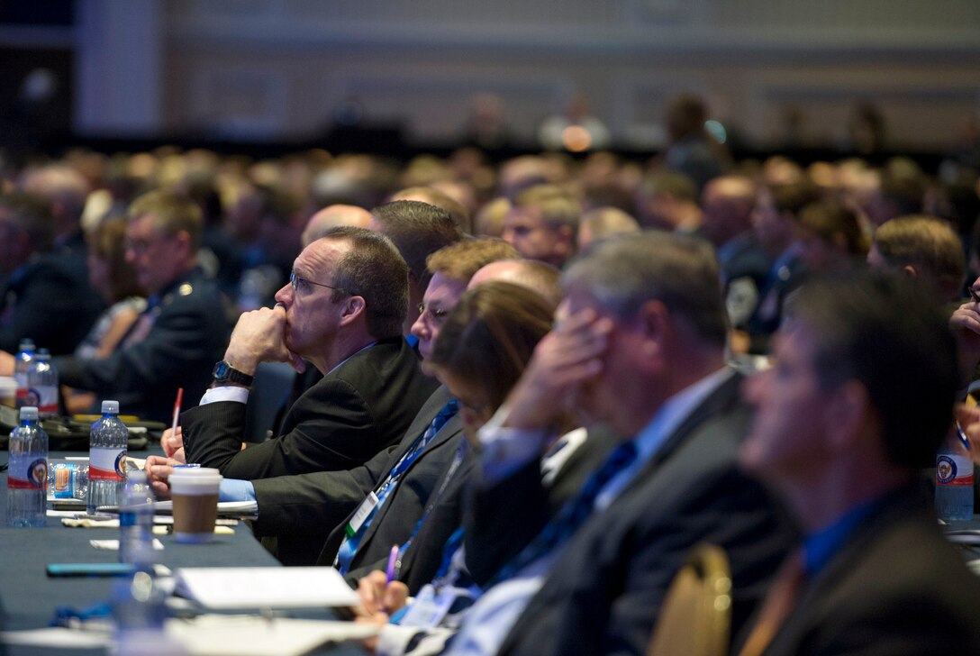 Air Force Association Air and Space Conference attendees listen as Defense Secretary Ash Carter delivers remarks at the Gaylord National Resort and Convention Center in National Harbor, Md., Sept. 16, 2015. U.S. Air Force photo by Senior Master Sgt. Adrian Cadiz