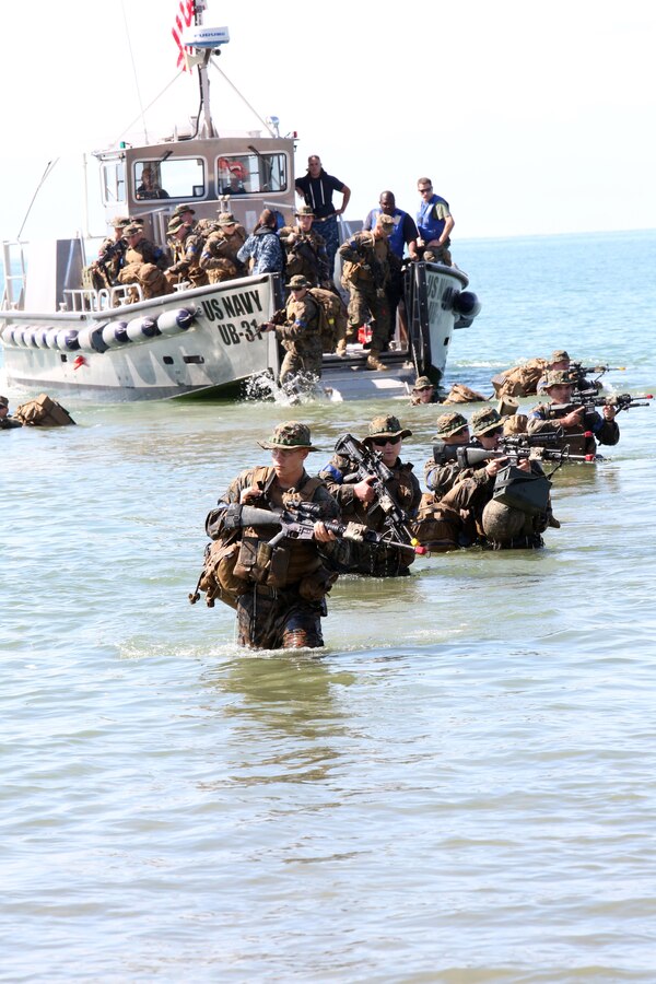EVANGOLA STATE PARK, N.Y. – Marines, sailors and members of the Canadian Army conduct an amphibious landing at Evangola State Park, New York, Sept. 11, 2015. The landing was part of exercise Lake Effect, which was a joint exercise focusing on patrolling and strengthening the interoperability between each service. The Marines are with Charlie Co, 1st Battalion, 25th Marine Regiment, 4th Marine Division, Marine Forces Reserve, the Canadians are with the Royal Hamilton Light Infantry, Wentworth Regiment and the sailors are with full time service support staff in Buffalo, U.S. Navy mid Atlantic Reserve Component Command. (U.S. Marine Corps Photo By Cpl. J. Gage Karwick/Released)