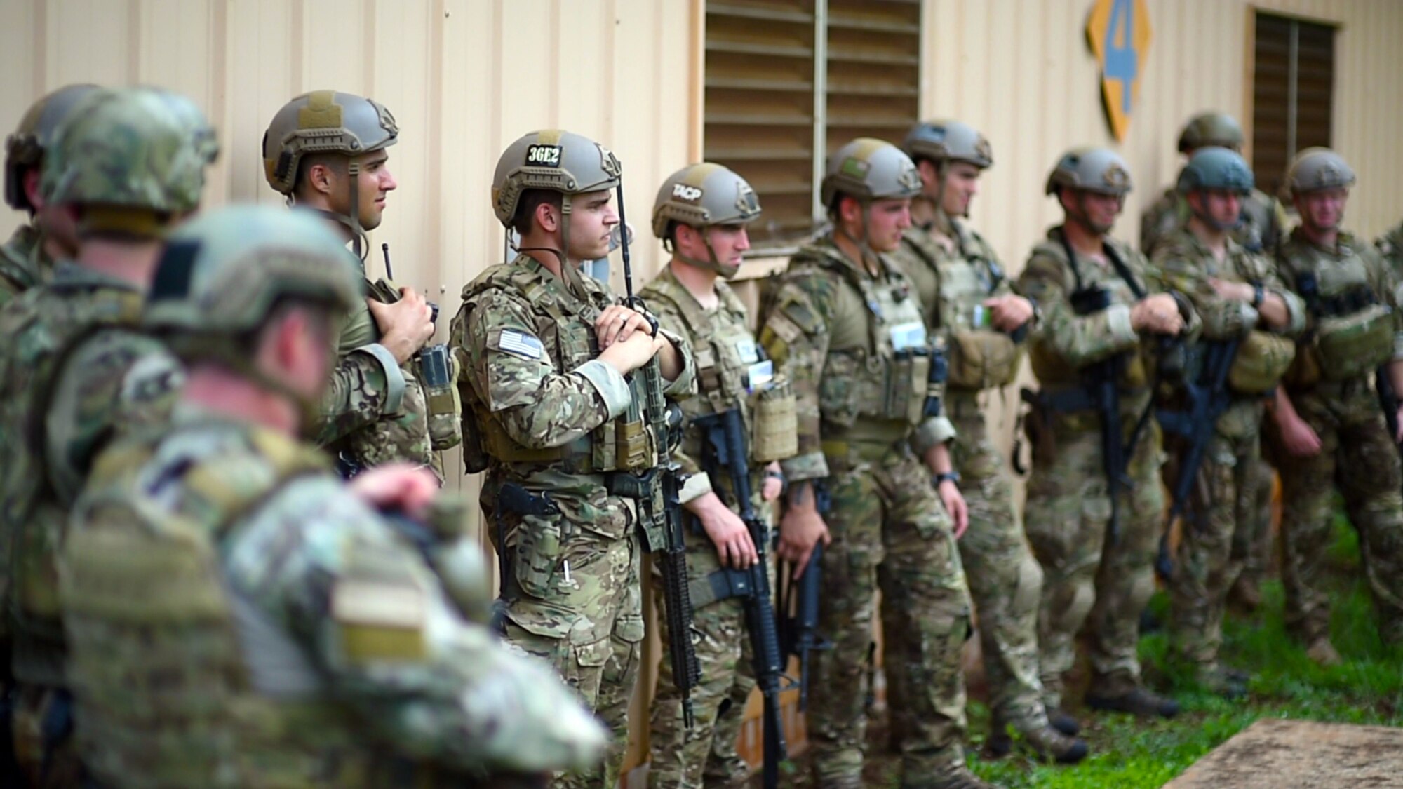Participants of the second-annual Cascade Challenge receive a safety briefing before the the live-fire stress shoot, held at Schofield Barracks, Hawaii, Sept. 9, 2015. The Cascade Challenge lasted three days and pitted nine two-man teams in a competition to test their combat skills, knowledge, and abilities specific to the Tactical Air Control Party mission. (U.S. Air Force photo by Senior Airman Christopher Stoltz/Released)