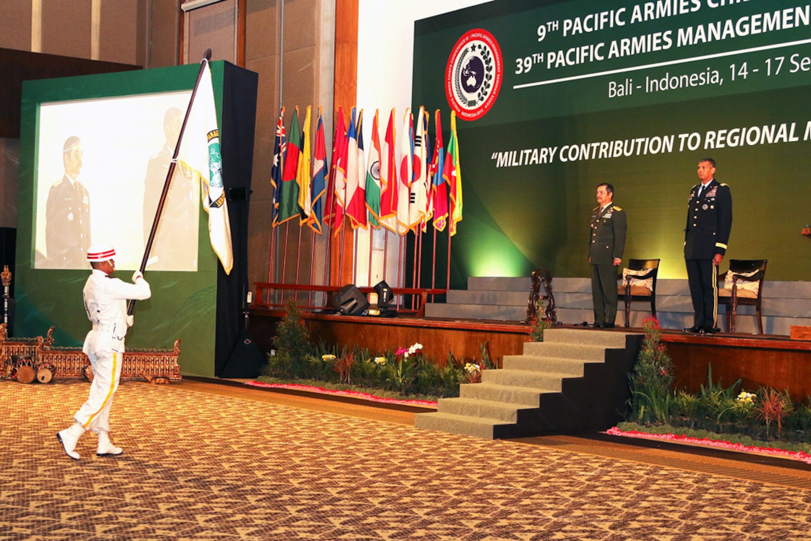 DENPASAR, Indonesia (Sept. 14, 2015) - Indonesia National Army color guard presented the Pacific Armies Chiefs Conference (PACC) & Pacific Armies Management Seminar (PAMS) flag to Lt. Gen. Erwin Syafitri, Indonesian Army Vice Chief of Staff, and Gen. Vincent K. Brooks, U.S. Army Pacific Commanding General, co-chairs for PAMS XXXIX, to signify the opening of the seminar,.