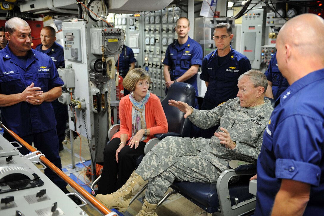 Army Gen. Martin E. Dempsey, center right, chairman of the Joint Chiefs of Staff, his wife, Deanie, discuss U.S. ice-breaking capabilities and polar operations with Coast Guard Capt. George Pellissier, left, commander of U.S. Coast Guard cutter Polar Star, a polar icebreaker home ported in Seattle, Oct. 3, 2012. U.S. Coast Guard photo by Petty Officer 3rd Class Nathan W. Bradshaw