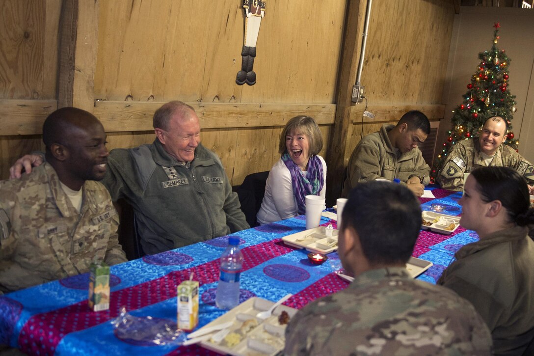 U.S. Army Gen. Martin E. Dempsey, chairman of the Joint Chiefs of Staff, and his wife, Deanie, have breakfast with soldiers stationed on Bagram Air Base, Afghanistan, Dec. 10, 2013. DoD photo by D. Myles Cullen