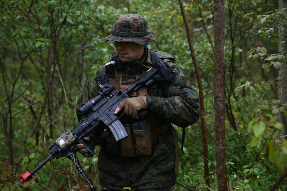 EVANGOLA STATE PARK, N.Y. – Lance Cpl. Edward Doyle, a rifleman with Charlie Co., 1st Battalion, 25th Marine Regiment, 4th Marine Division, Marine Forces Reserve, patrols through the woods during exercise Lake Effect at Evangola State Park, New York, Sept. 12, 2015. Each platoon in Charlie. Co. set up their own patrol bases and routes which occasionally lead to confrontation with the other platoons, adding an element of realism to the training. (U.S. Marine Corps Photo By Cpl. J. Gage Karwick/Released)