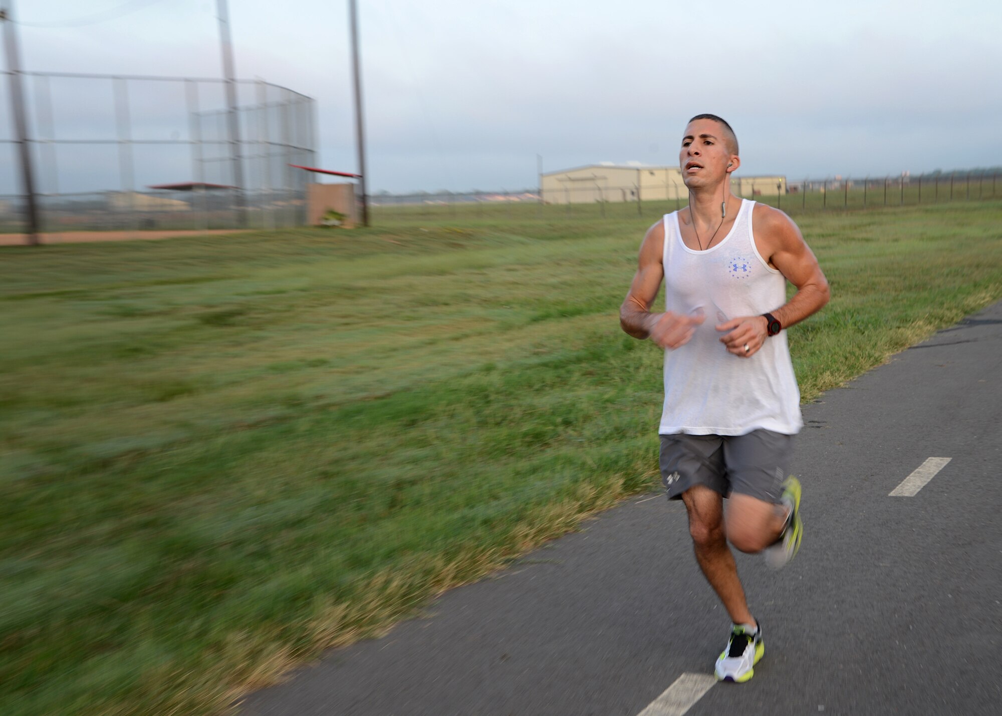 Master Sgt. Nader Chebaro, 2nd Munitions Squadron first sergeant, approaches the finish line in the Sept. 11, remembrance 5K Run on Barksdale Air Force Base La., Sept. 11, 2015. Approximately 300 of members of Team Barksdale participated in the run. (U.S. Air Force photo/Senior Airman Joseph A. Pagán Jr.)
