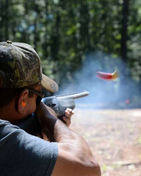 Otis Kimmons, 2nd Force Support Squadron Outdoor Recreation aid, shoots a target at the Red Chute Shotgun Sports Club on Barksdale Air Force Base, La., Sept. 14, 2015. Kimmons took advantage of the new sporting clays range that grants shooters the closest experience to realistic hunting by providing an array of target trajectories, speeds and angles. (U.S. Air Force photo/Senior Airman Jannelle Dickey)