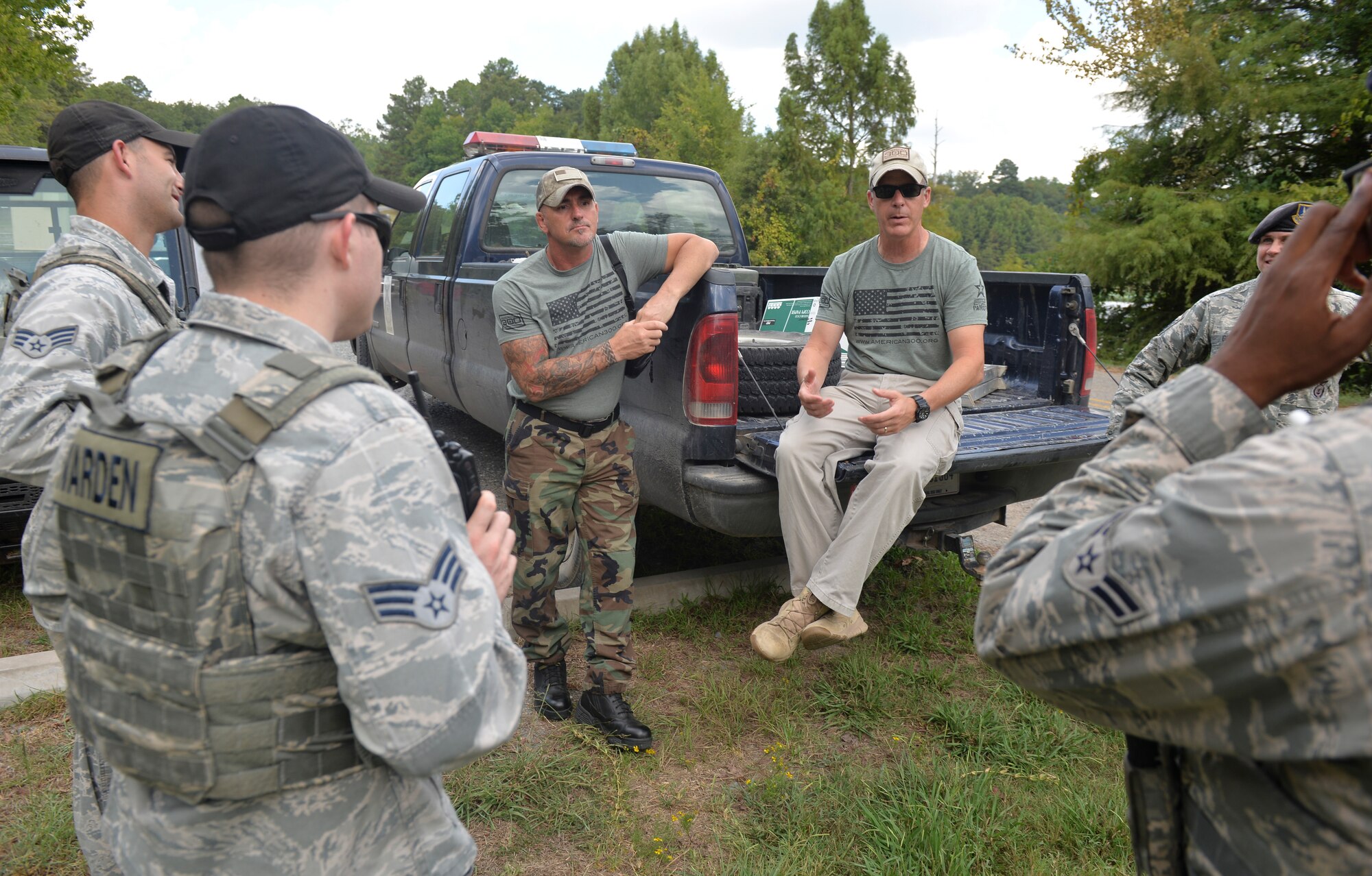 Shannon Ritch, mixed martial artist, and Robi Powers, American 300 founder, speaks with game wardens from the 2nd Security Forces Squadron at Barksdale Air Force Base, La., Sept. 10, 2015. Ritch and Powers visited various Airmen around Barksdale to discuss resiliency and how it’s molded them into, the men they are today and how they view the world. (U.S. Air Force Photo/Airman 1st Class Mozer O. Da Cunha)
