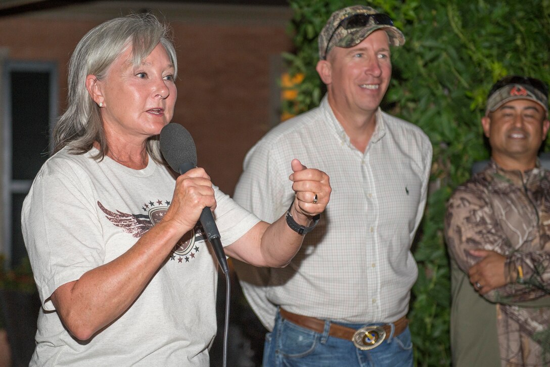 Deborah Clark and Brig. Gen. Patrick Doherty, 82nd Training Wing commander, provide closing comments at the 11th Annual Dove Salute in Henrietta, Texas, Sept. 12, 2015. The Dove Salute welcomed Airmen to the community with a hunt and Texas-style steak feast on the Birdwell and Clark Ranch, with a closing thank you from the ranchers and 82nd Training Wing. (U.S. Air Force photo by Senior Airman Kyle Gese/Released)